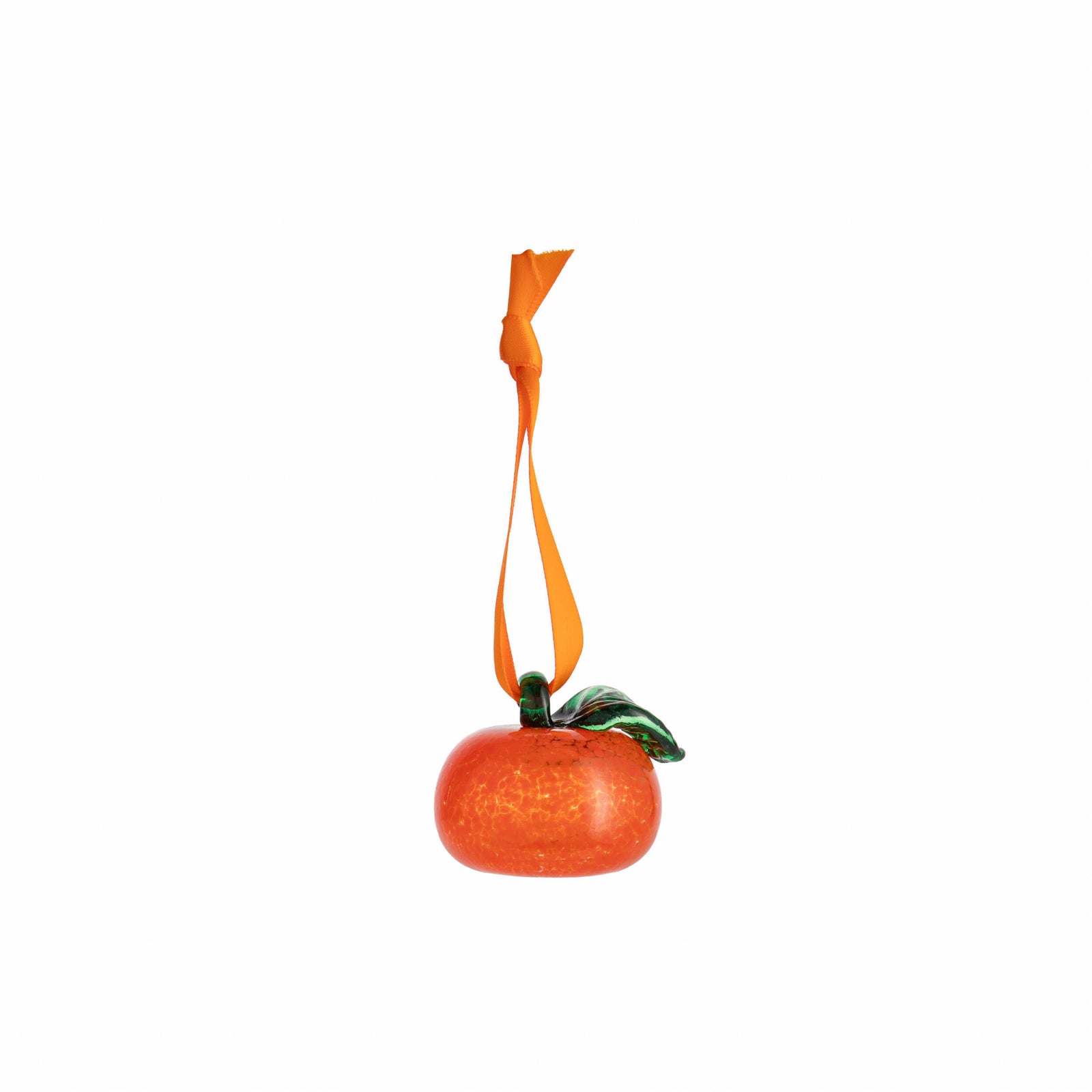 Brighten your home with this hand-blown glass orange ornament. Each unique piece features a vibrant orange body and green top. Perfect for any space. 1.5" x 2"