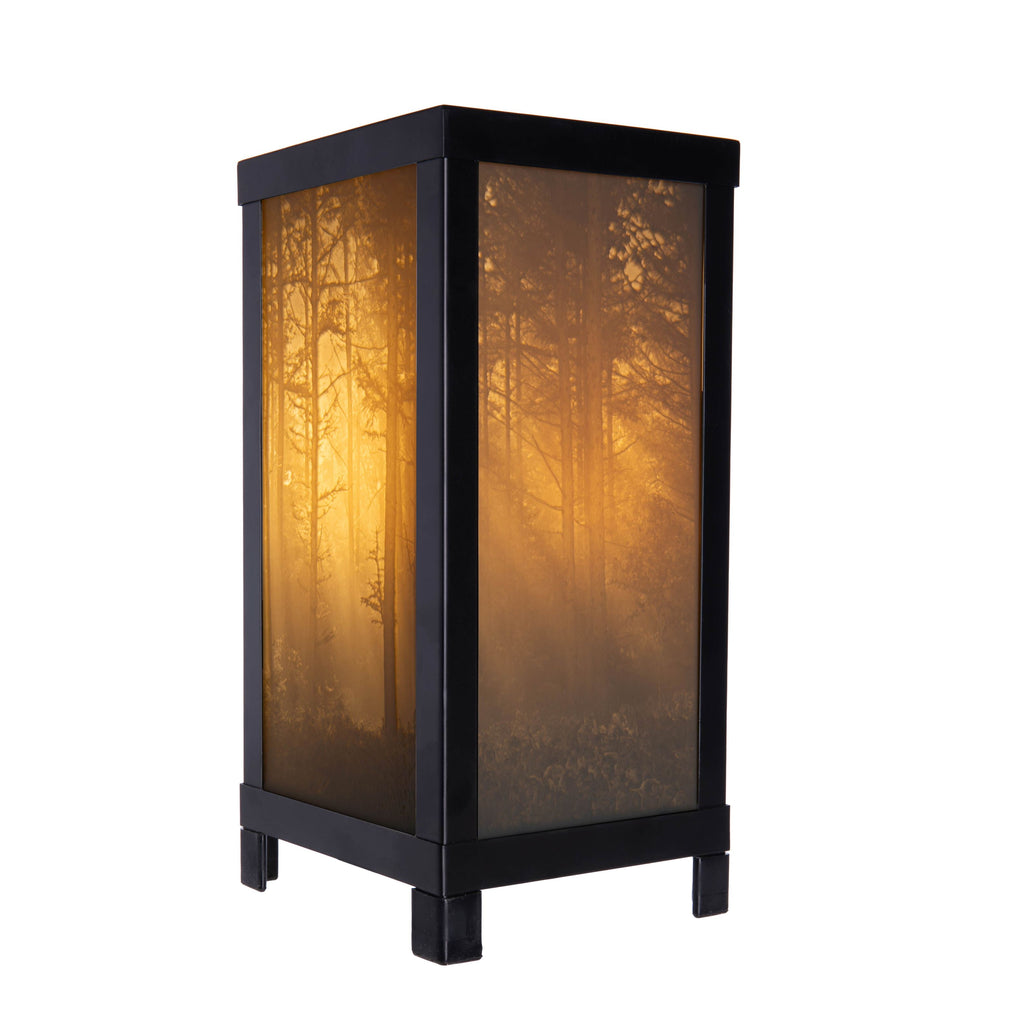 Transport yourself to the wonderful woodlands with this Lithophane Lamp featuring Woodland Sunbeams. The warm light emanating from this lamp evokes the peaceful nature of the magical woodlands. With the textured porcelain, the lamp's textured panel will never fade or discolor Dimensions: Approx. 13" H x 6" W x 6".