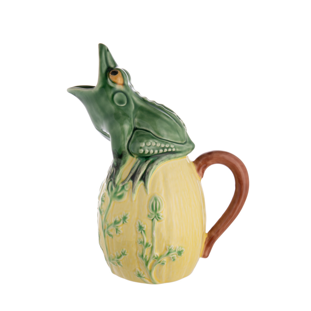 Once you've served drinks from this fabulous frog pitcher, regular pitchers will look downright dull. This cute critter is made by master ceramics atelier Bordallo Pinheiro, which was founded in Caldas da Rainha, Portugal, in 1884.  Dimensions: 8.2" x 5.1" x 10.6". Capacity: 47 fl oz.