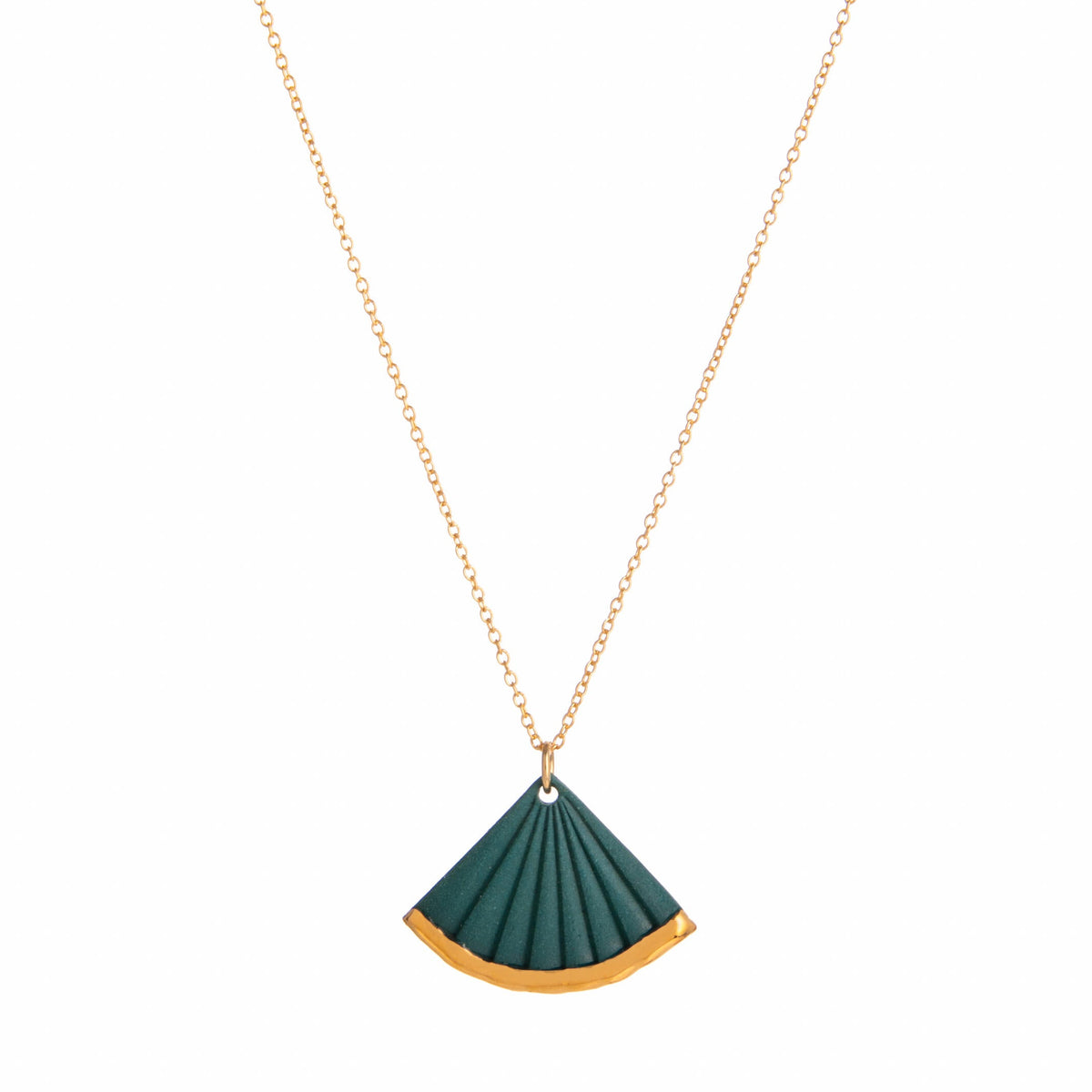 Green fan-shaped pendant on a gold chain against a white background