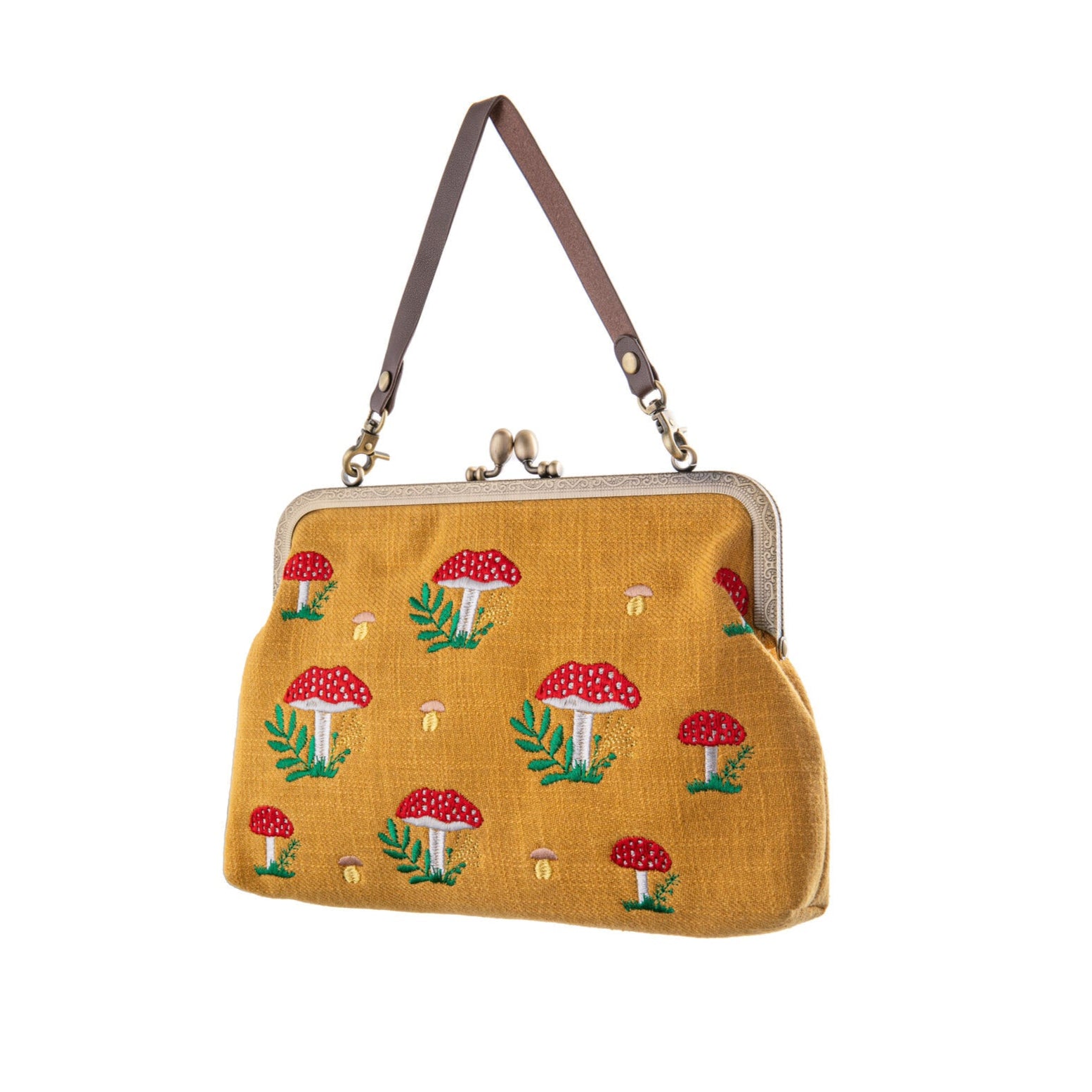 This fabulously fun embroidered mushroom purse is a charming and elegant accessory that combines style with a touch of nature-inspired whimsy. Crafted with meticulous attention to detail, it features embroidered red and taupe mushrooms on both sides. This cleverly designed purse includes two detachable straps, so it can be worn three ways: as a clutch purse, a short-handled purse, or a shoulder bag. 
