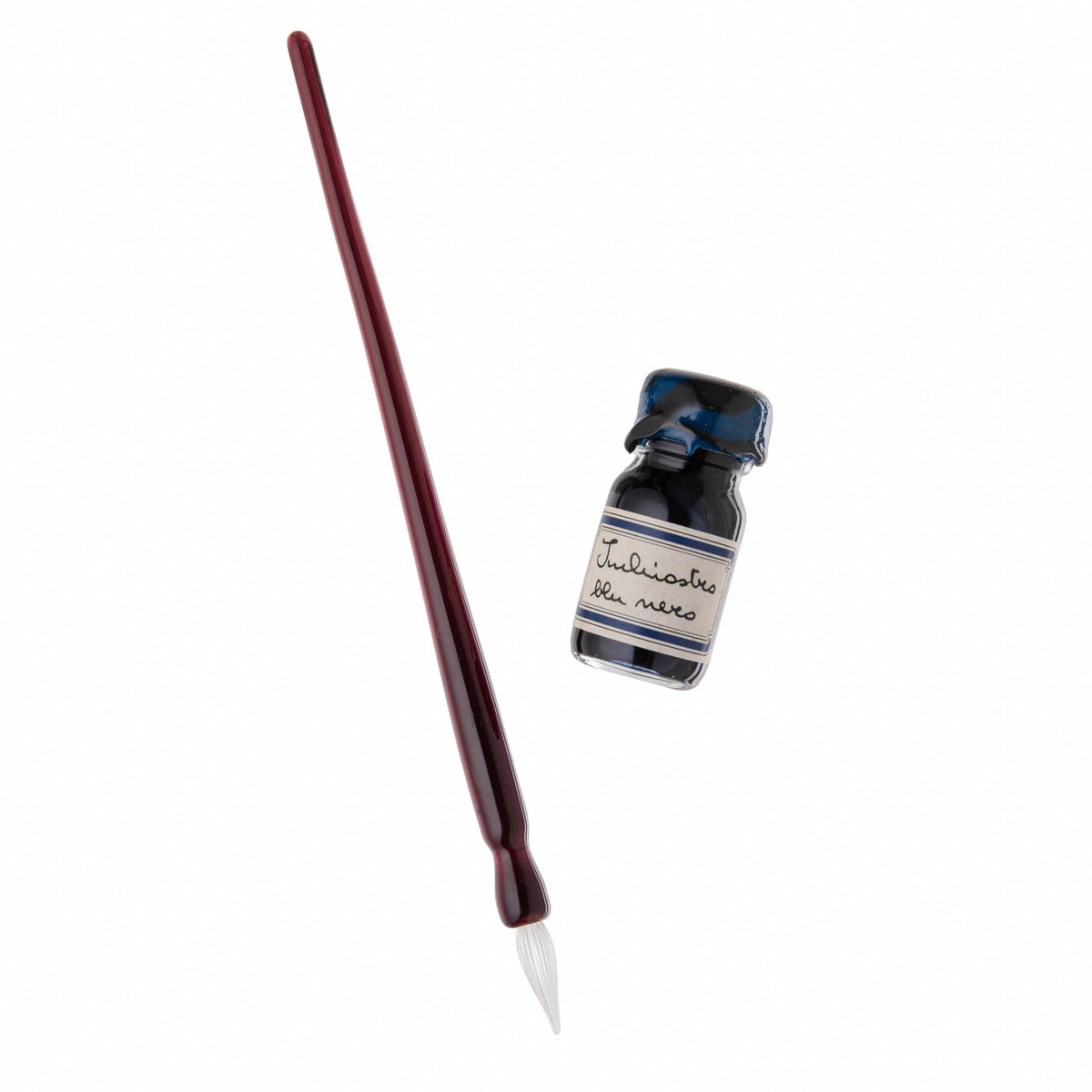 Calligraphy pen and ink bottle on a white background