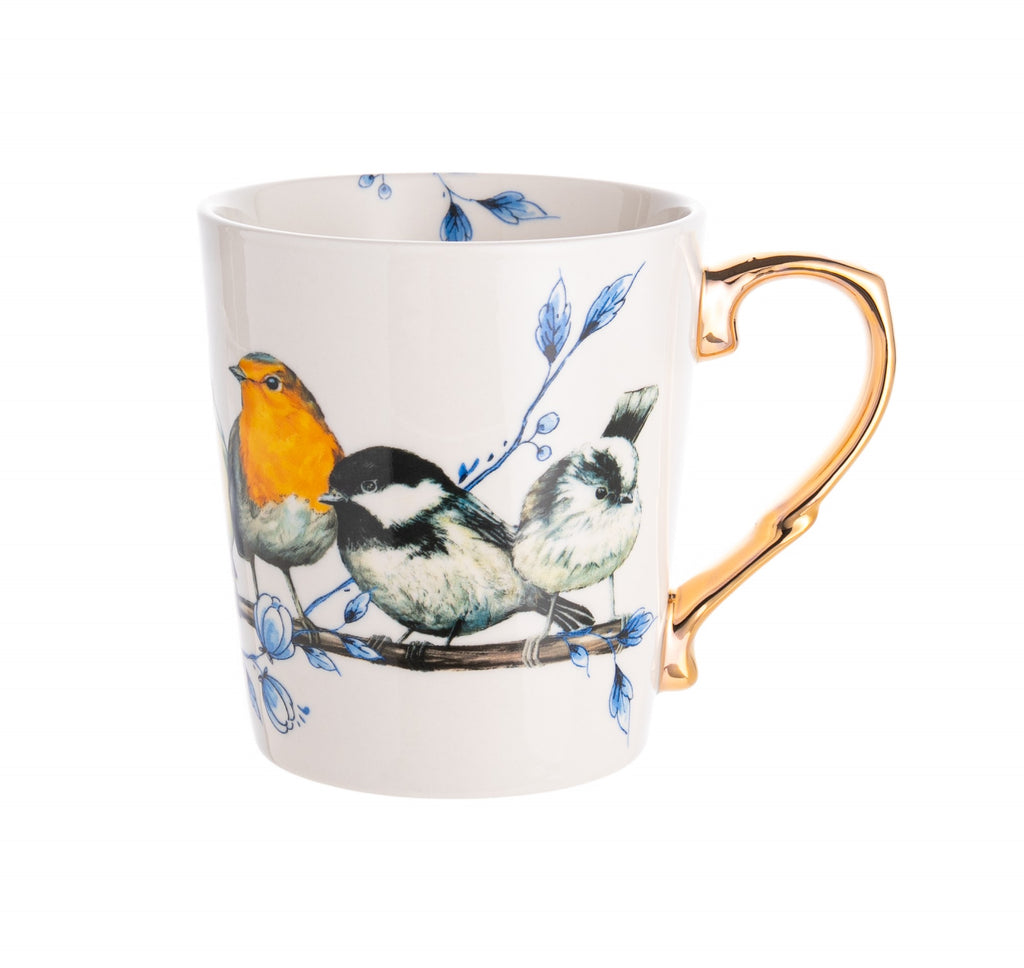 Delft blue porcelain is the Dutch version of blue and white porcelain, which has been around since the late 16th century. This forest bird's porcelain mug celebrates that Delft blue Dutch touch. With a chic gold handle, this mug adds a bit of glitz and glamour to these sweet forest birds perched on a branch. 10 oz.