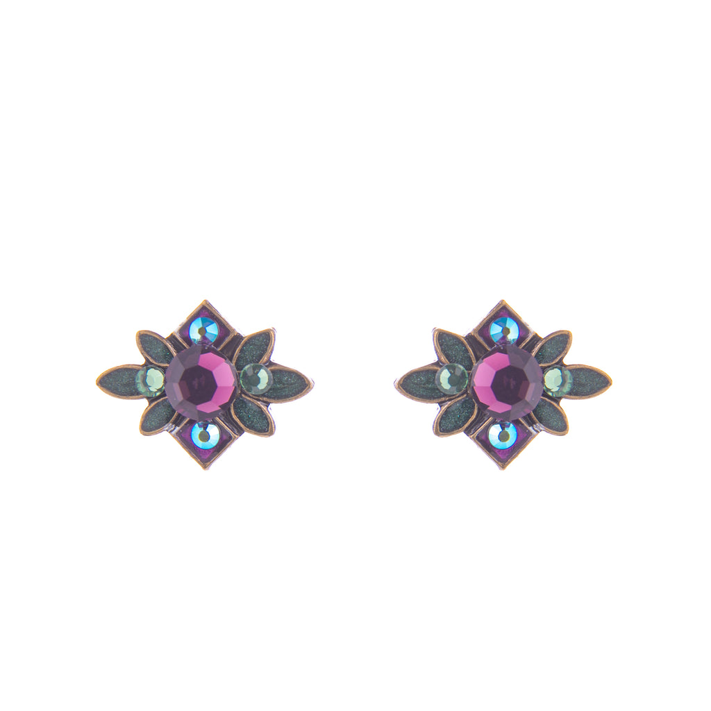Add eye-catching sparkle to your look with these bronze plated earrings. Detailed with crystals in erinite, amethyst and amethyst AB, which gives an iridescent look.  Stud earrings Bronze plated with crystals. Dimensions: 0.5" x 0.25".