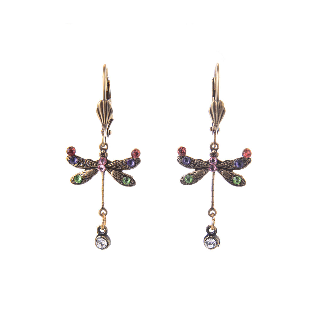 The dragonfly symbolizes wisdom, light, and adaptability. It appears as a reminder to keep joy in your life. These earrings feature a beautiful dragonfly with intricate metalwork wings and crystal accents. Nickel free antiqued brass Surgical steel posts Glass crystal accents Dimensions 1" x 3/4" Made in the USA.
