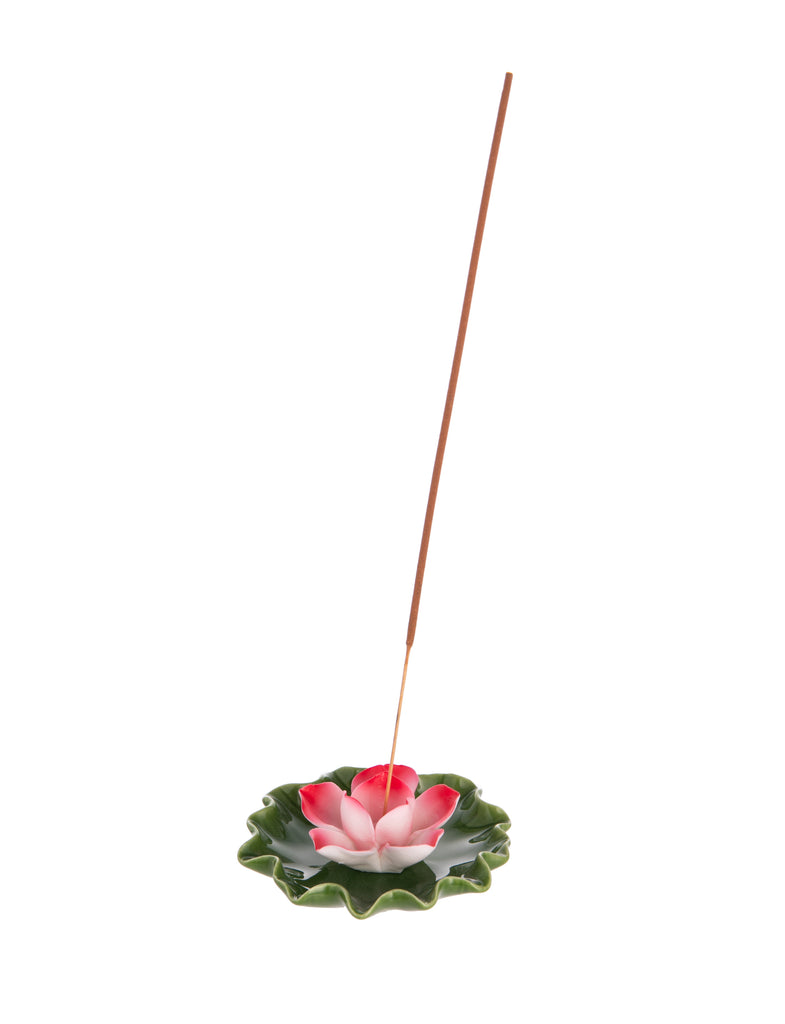 In some cultures, the lotus flower is seen as a symbol of strength and resilience. You can bring this powerful symbol into your home with this Pink Lotus Incense Burner. Center your incense stick in the middle of the lotus flower and be transported to a meditative lotus pond. Dimensions: 3.5" x 1.3" Material: ceramic.