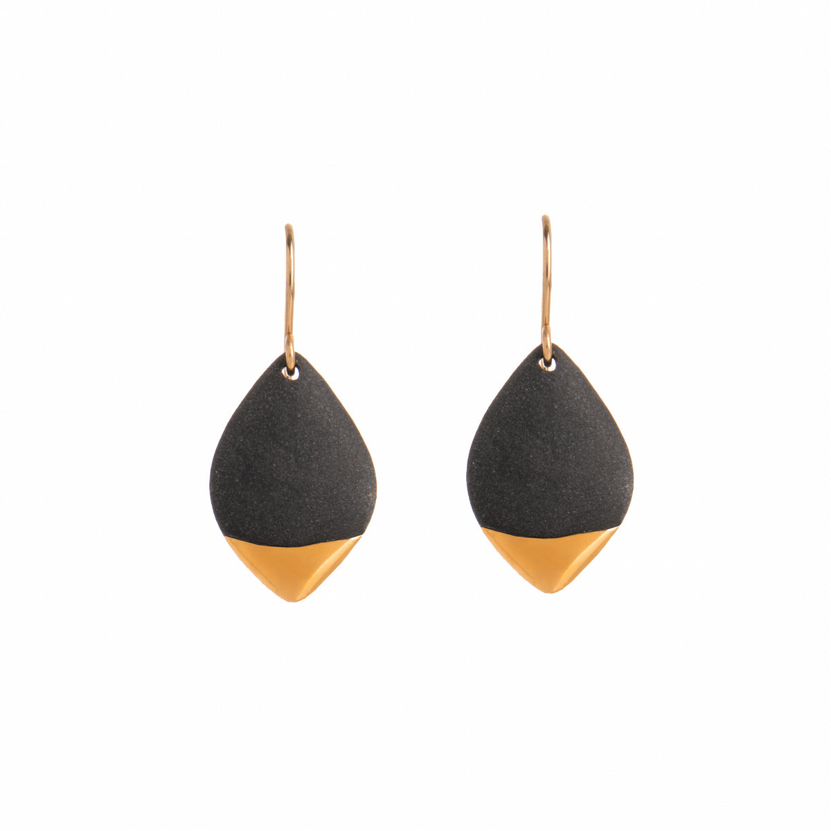 Black and gold teardrop earrings on a white background