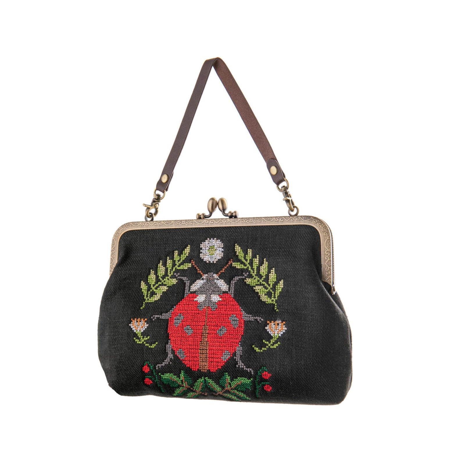 Embrace whimsical charm with this delightful ladybug cross stitch vintage style purse. This fabulous accessory combines playful design with an adorable ladybug motif. This bag is perfect for those who appreciate unique and eye-catching fashion pieces.