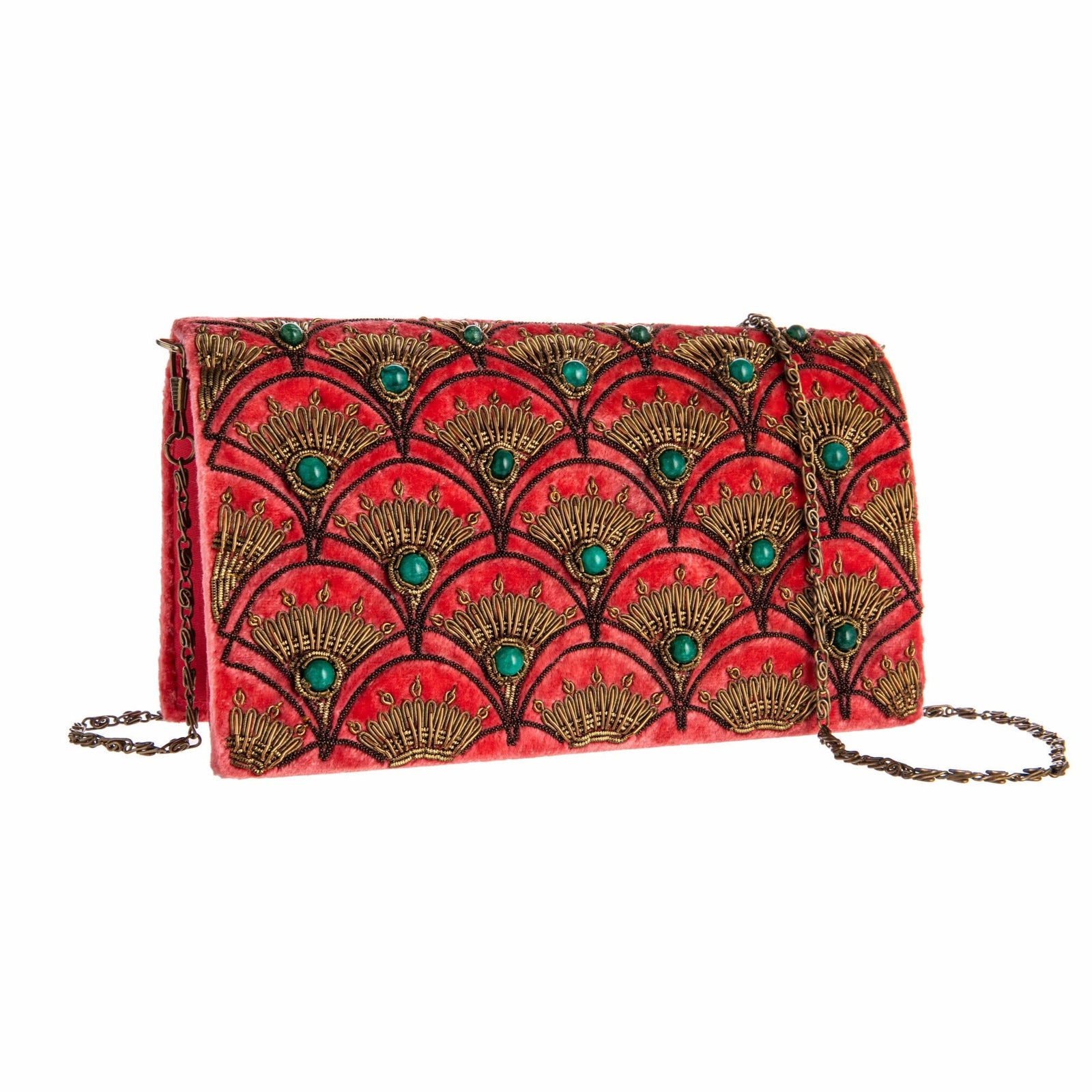 Coral velvet clutch bag with gold and green beaded embroidery pattern on a white background