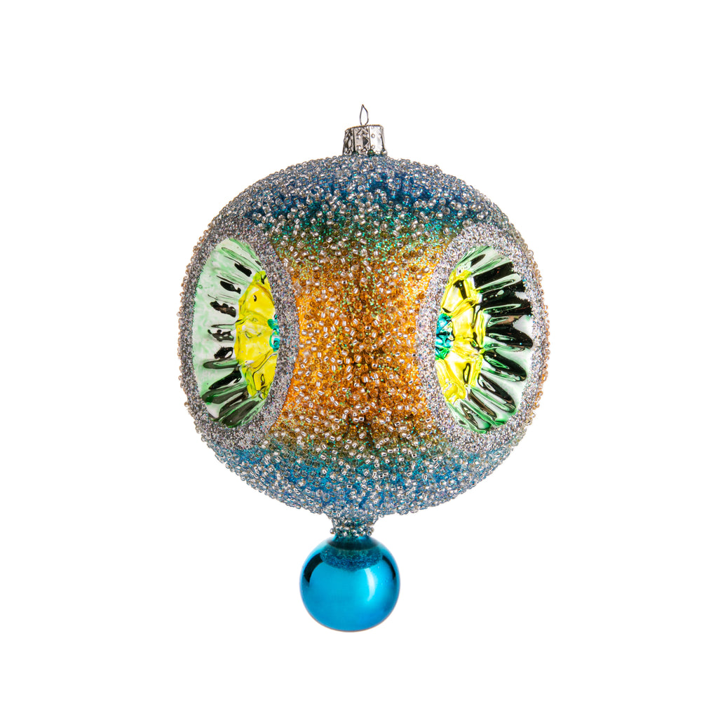 We are absolutely *blown away* by these stunningly colorful glass-blown ornaments! Substantial in color and size, these ornaments are hand-painted and decorated and made in traditional glass-blown style by European artisans. Textured with beads, and painted with bright ombré-style colors. Dimensions: Approx. 6.5" H 