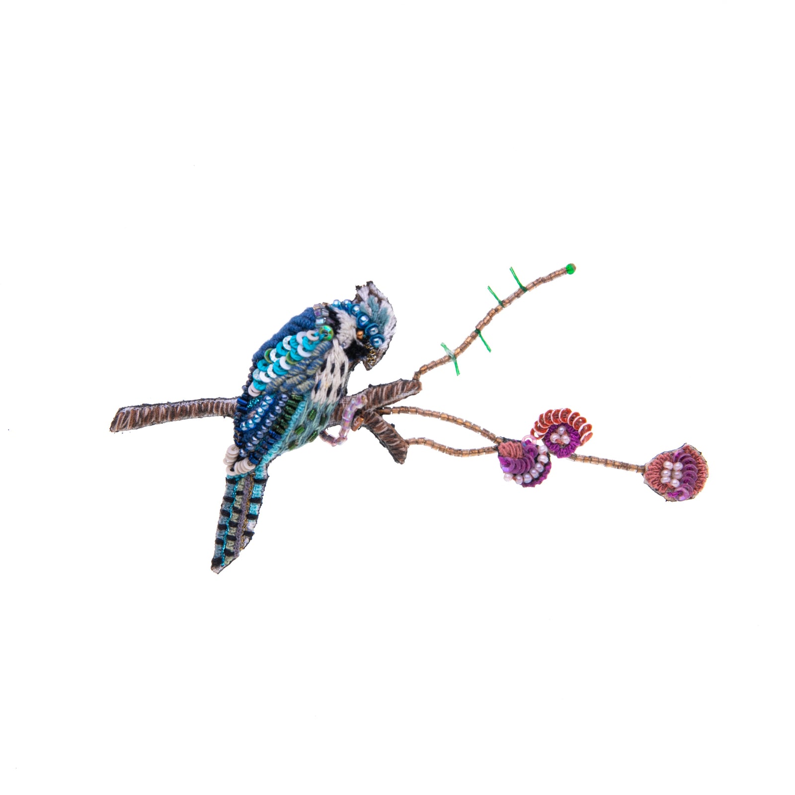 In some cultures, blue jays are a symbol of confidence and also of good things to come. This detailed, hand-made jay bird pin features intricate beading and embroidery on a base of cotton and felt. Add this pin to your outfit for a dose of extra luck and confidence. Materials: Cotton, felt, metal, beads. 3.5" x 2".      316 of 320 characters used