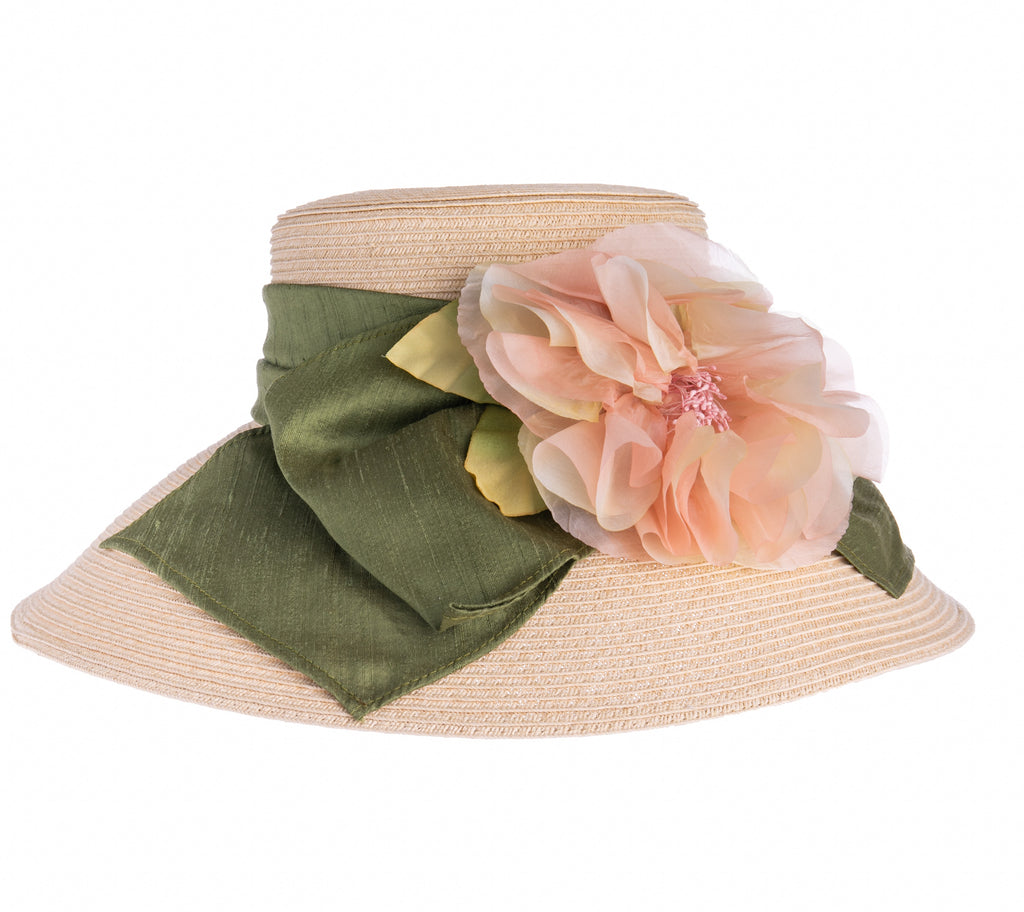 This stunning packable straw braid sunhat features a deep olive green slub satin ribbon and pale peach silk organza rose. This is the perfect hat for a wedding, garden party, or any summer event. Made in the USA. Adjustable fit drawstring grosgrain ribbon internal sweatband. One size- approx: 6" Crown.