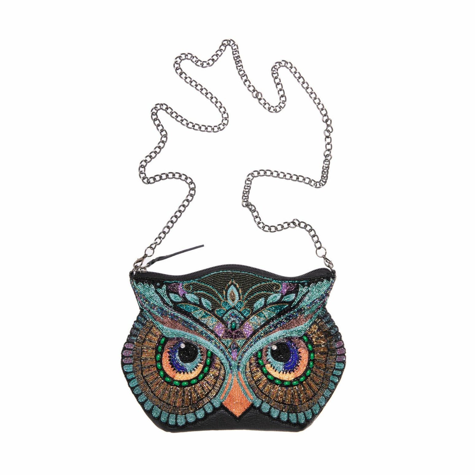 Make heads turn with this stunning, hand-beaded owl crossbody handbag. Its vibrant embroidery and intricate, shimmering beadwork make a beautifully bold and infinitely wise style statement. The purse can be worn as a clutch or a crossbody bag. Its base is soft black leather, making it durable and comfortable to wear.