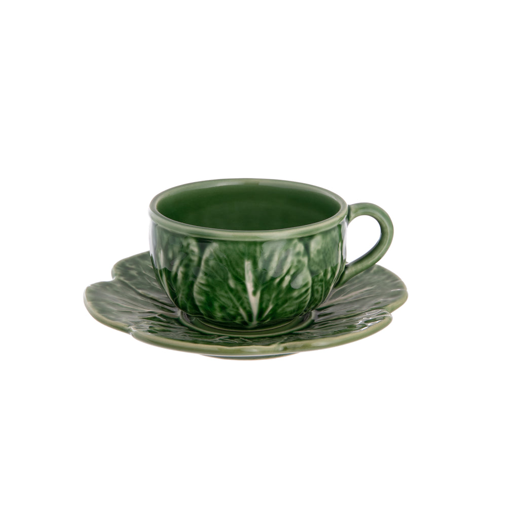 Add a dose of humor to your morning coffee or afternoon tea with this delightful cabbage-leaf shaped cup and saucer. This cute cup is made by master ceramics atelier Bordallo Pinheiro, which was founded in Caldas da Rainha, Portugal, in 1884. Handmade. 6.1" x 6.1" x 3.1" * Matching teapot available.