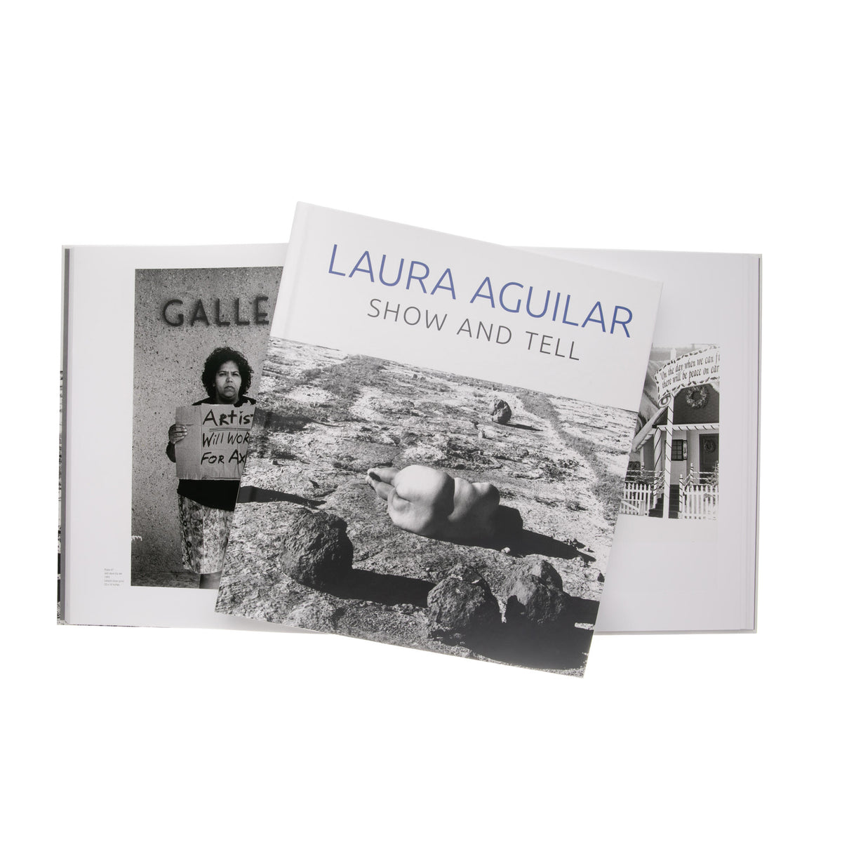 Two books titled 'Laura Aguilar Show and Tell' on a white background