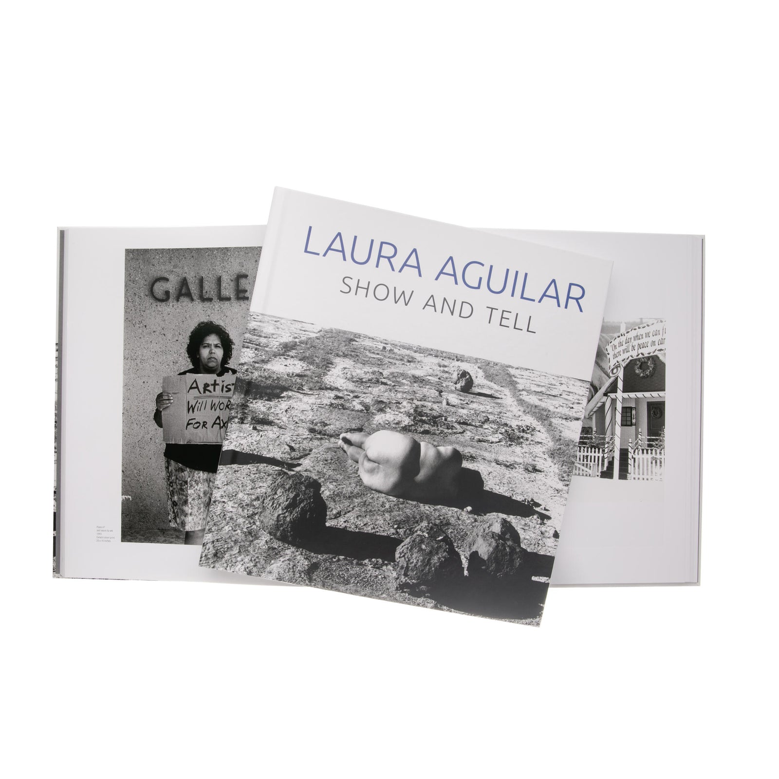 Two books titled 'Laura Aguilar Show and Tell' on a white background