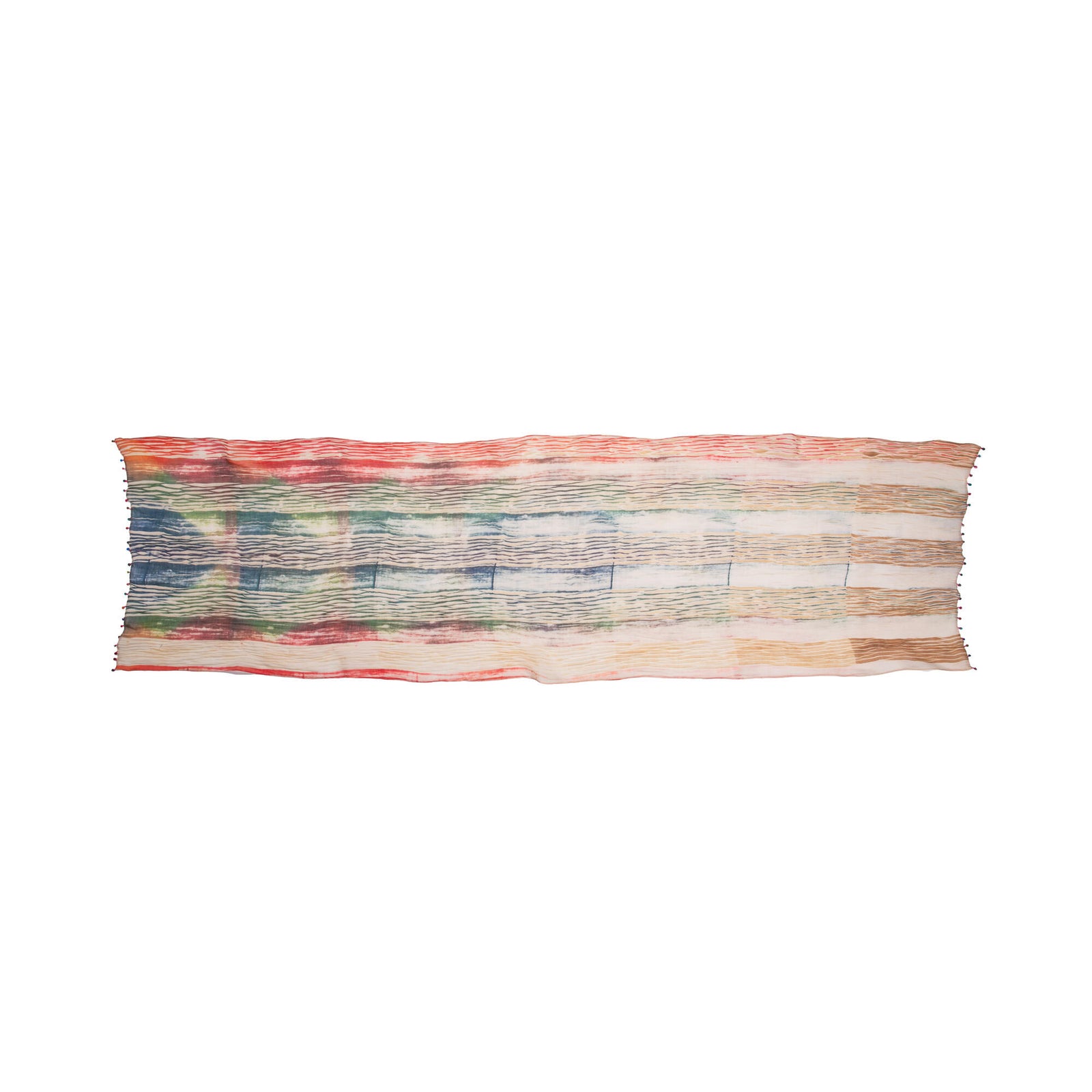 Stand out from the crowd with this beautiful shibori scarf! Entirely handmade, this colorful silk scarf is dyed by hand using the shibori technique. 