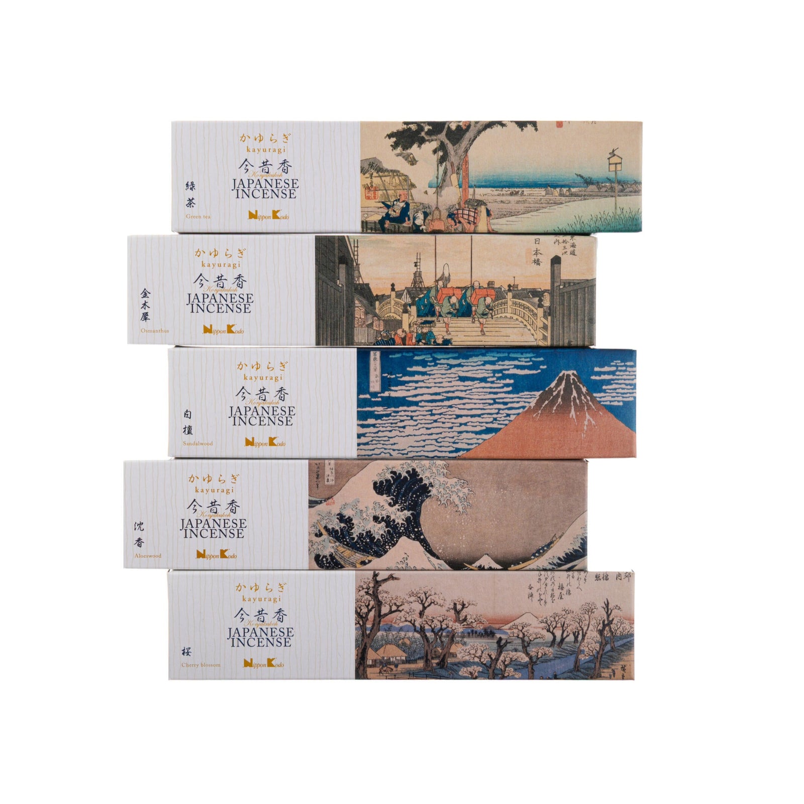 Japanese incense boxes with artistic designs on a white background