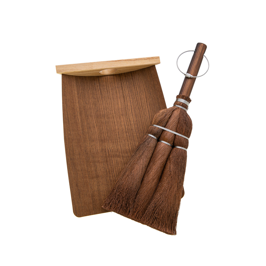 Tawashi are traditional brushes made from the fibers of the windmill palm. For centuries such brushes have been used in Japan for cleaning and sweeping. This Tawashi dustpan and brush set is handcrafted, one at a time. Materials: Windmill palm, Japanese cypress, stainless steel. Size: Brush: 4" x 11", Dustpan: 6" x 9".