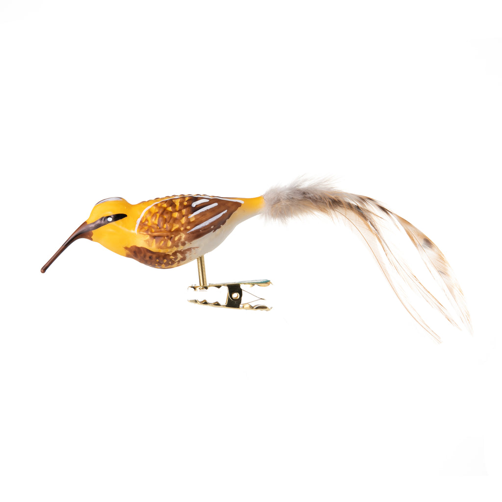 This Christmas-ready common snipe is made from hand-blown glass in a family-owned studio. Its tail is made with real feathers and has a hand-painted finish.