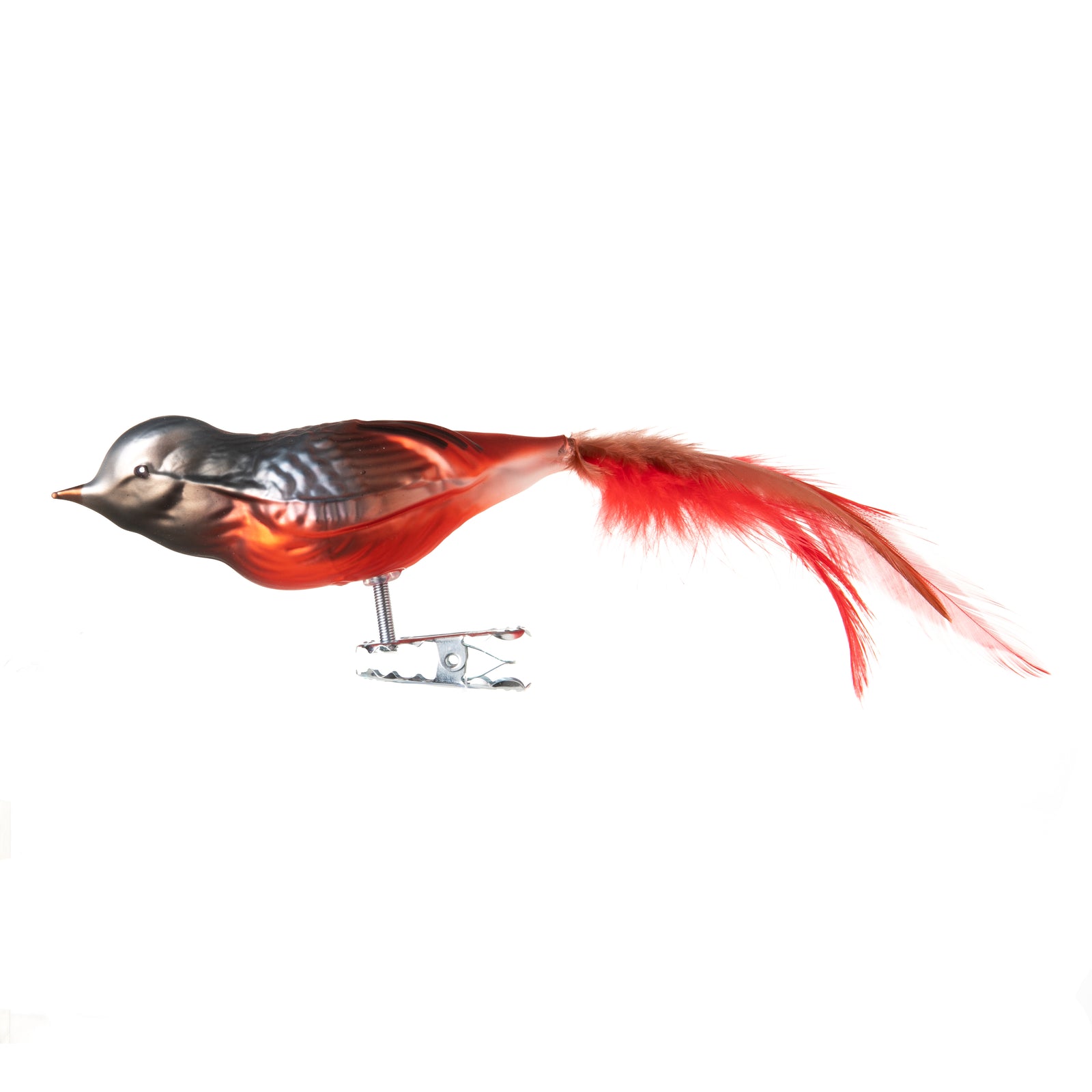 This common redstart bird is made from hand-blown glass in a family-owned studio. Its tail is made with real feathers and has a hand-painted finish.
