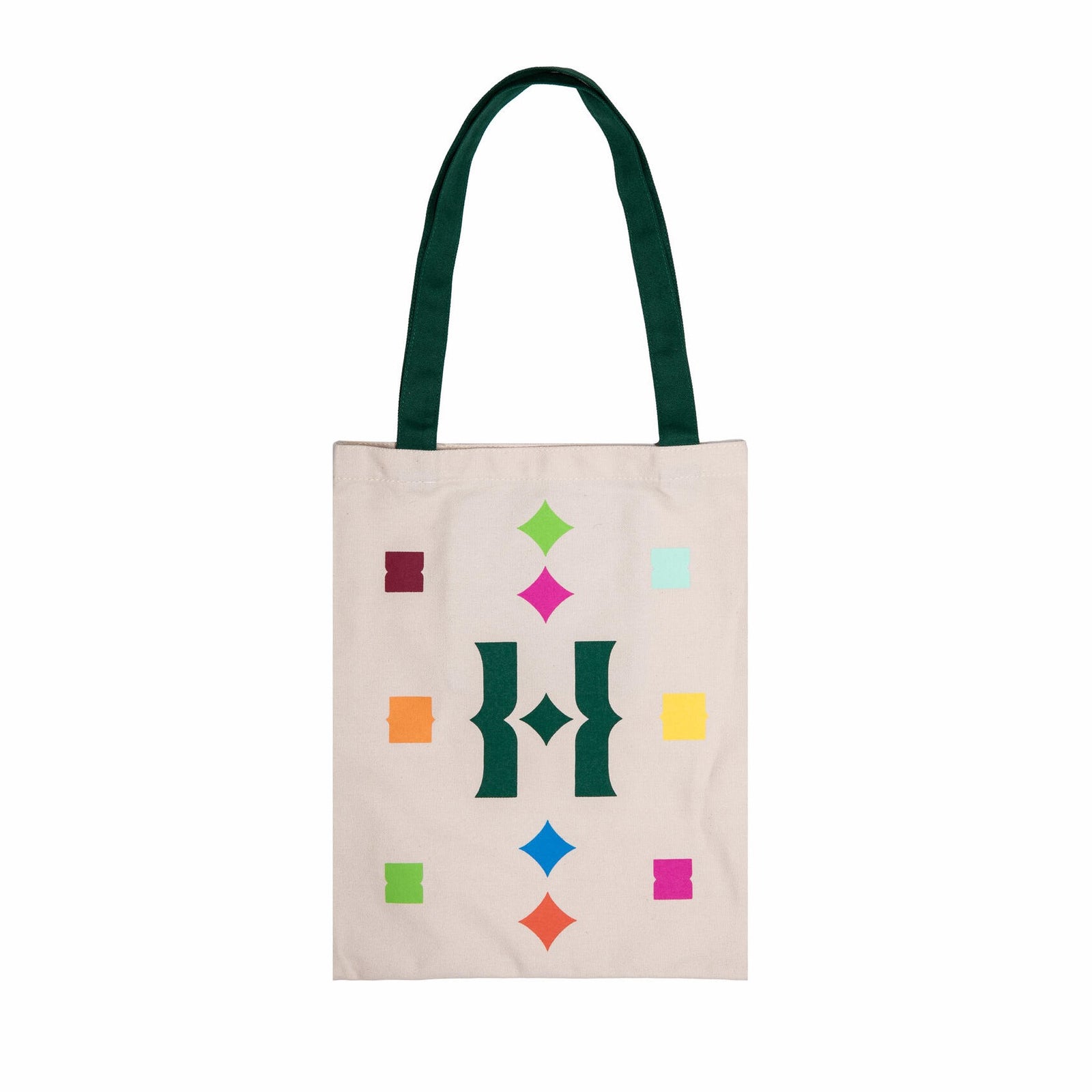 Our fun new Huntington H monogram tote is sprinkled shapes to add a pop of color to your farmers market shop, beach day, or library visit. Made from sturdy cotton canvas with reinforced straps and a handy interior slip pocket. Materials: 100% cotton canvas Dimensions: 13" x 15.5" Strap length 24.5" Huntington exclusive