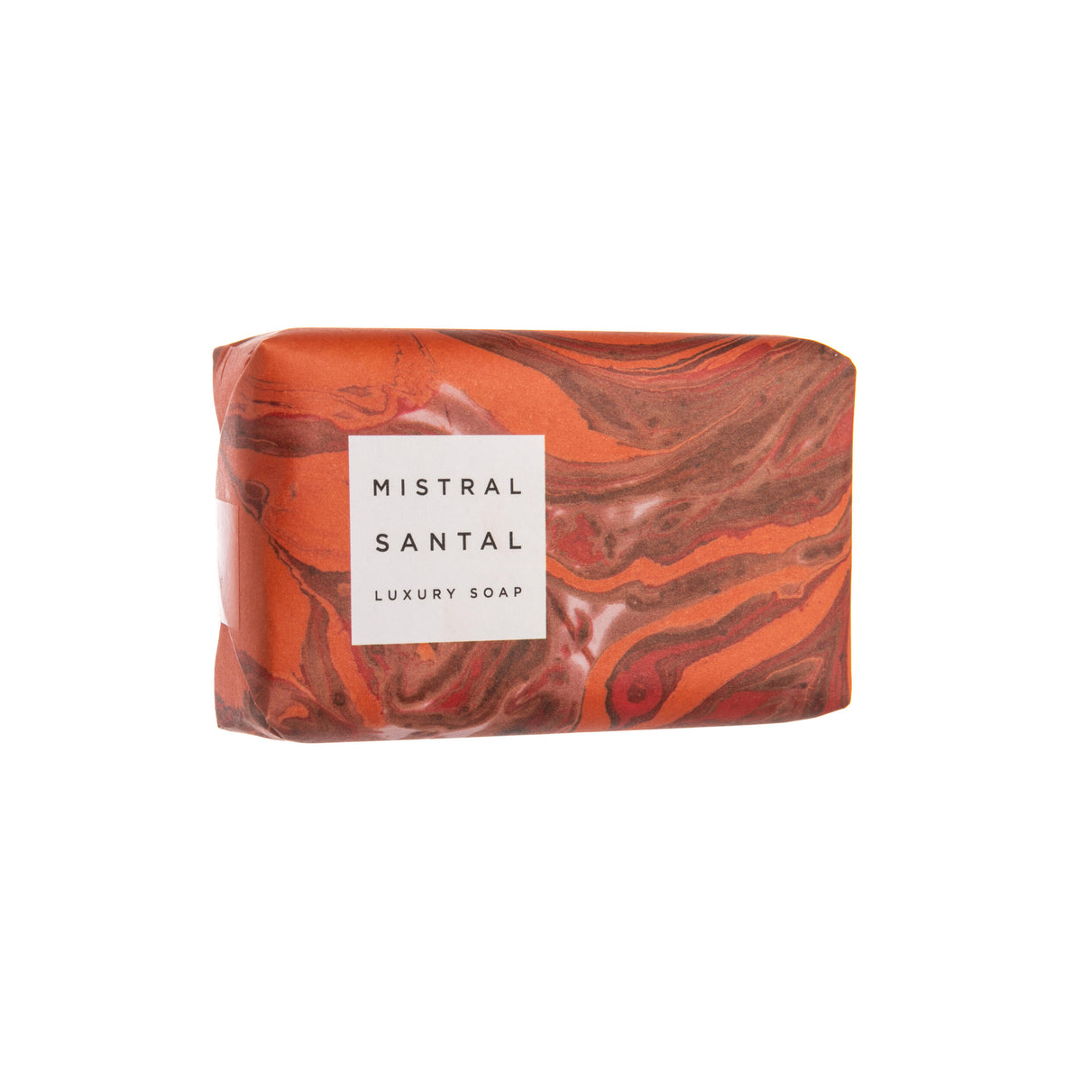 Marbled red and orange soap bar with &#39;Mistral Santal&#39; label on a white background