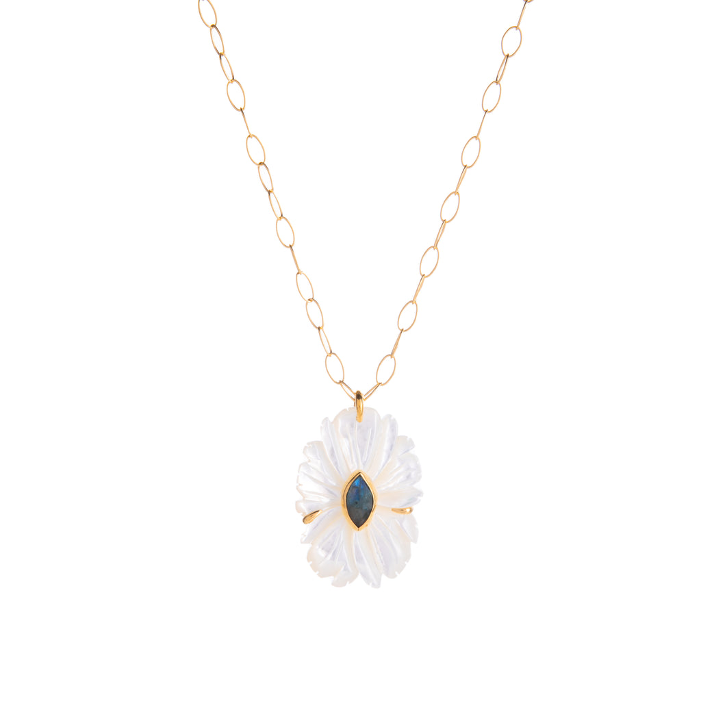 Harness the essence of a magnolia with this very elegant mother of pearl necklace. Featuring a hand-cut mother of pearl flower with a labradorite in the center.