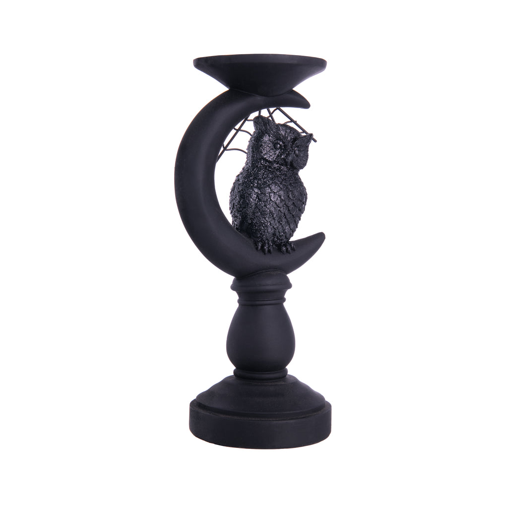 These matte black candle holders feature a raven about to fly, an owl within a crescent moon, and a raven within a crescent moon. With black glitter detail, these candle holders are sure to add Halloween glam to your tablescape or bookshelves. Be prepared for eerie vibes once you light a candle atop these holders. 