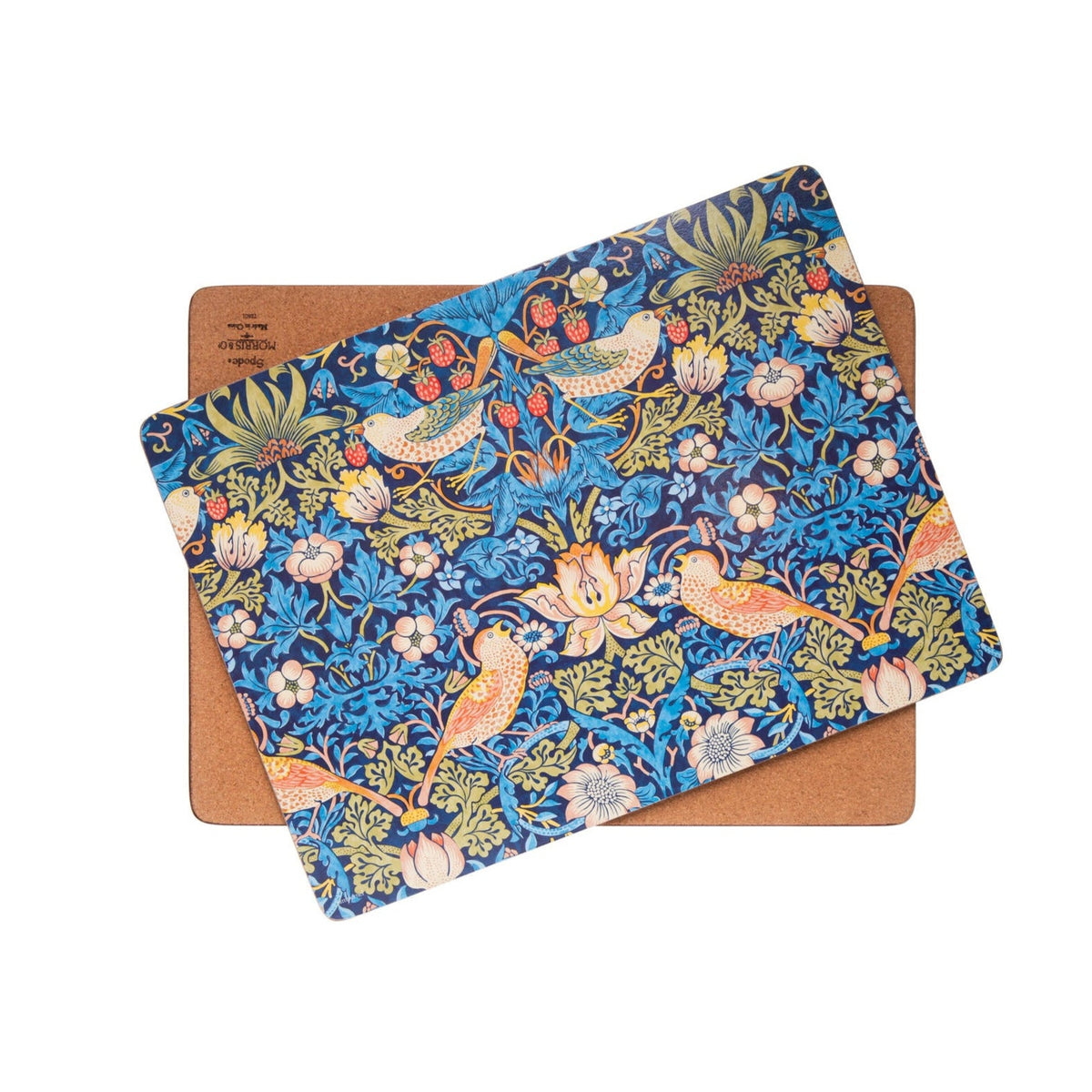 Set of two blue floral William Morris &#39;strawberry thief&#39; design placemats with orange birds on a wooden board against a white background