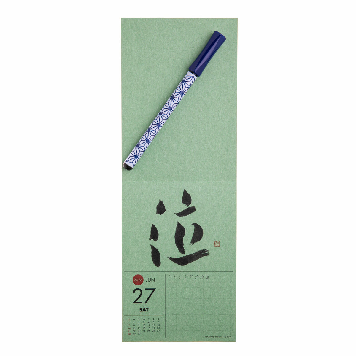 Green calendar with a pen on a white background