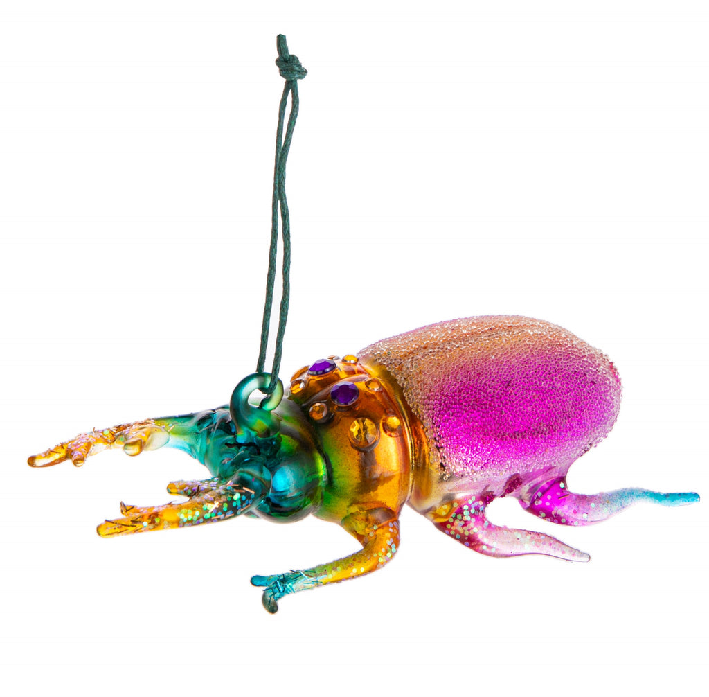 This is no ugly bug! This beautiful beetle is resplendent in multi jewel tones, with embellishments of rhinestones and glitter. 