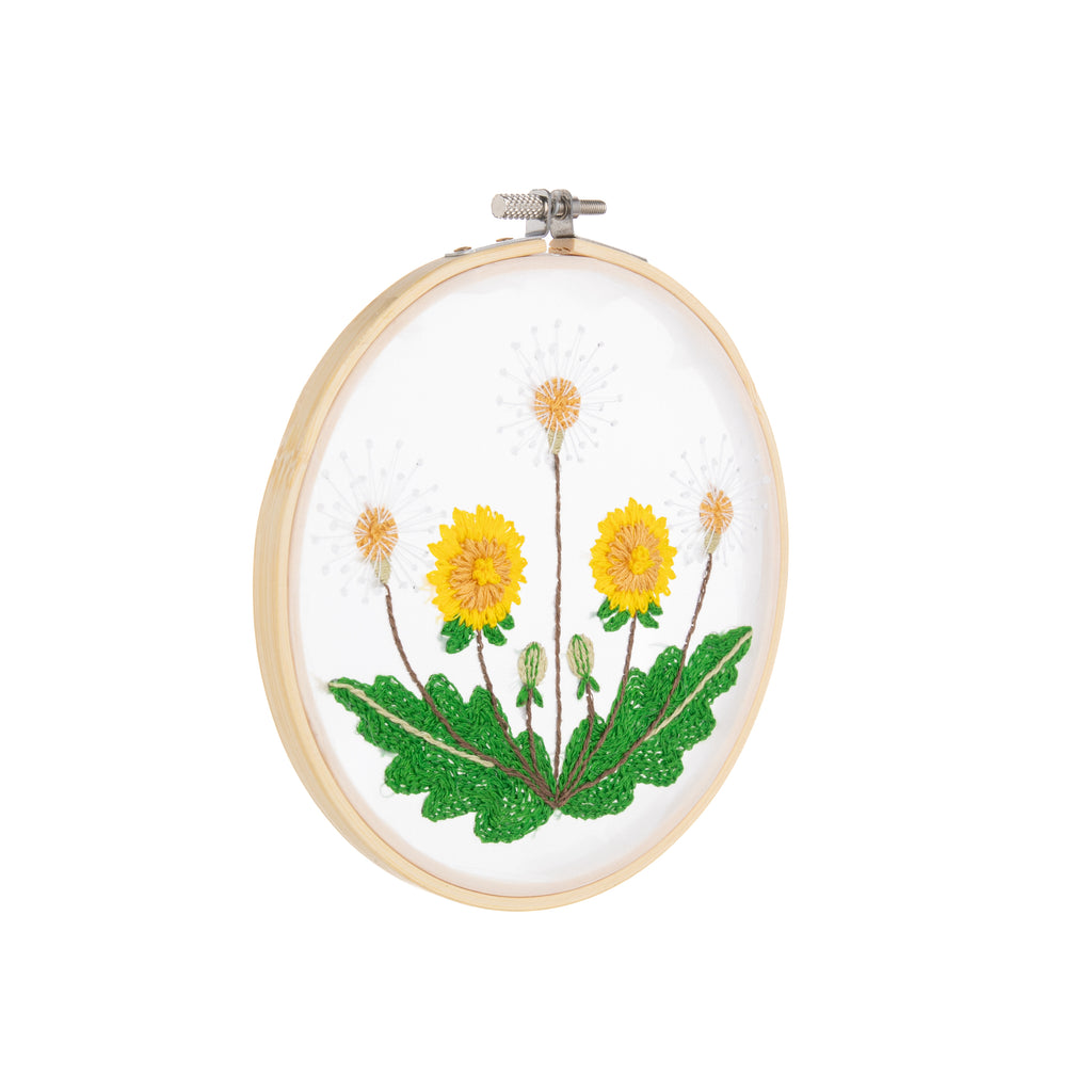 This printed embroidery kit includes everything you will need to make this pretty design, featuring dandelions. Includes 6" wooden embroidery hoop, embroidery floss, printed fabric, embroidery needle and instructions. Use the embroidery hoop to keep the fabric taut and then to display your project. 6" x 3/4".