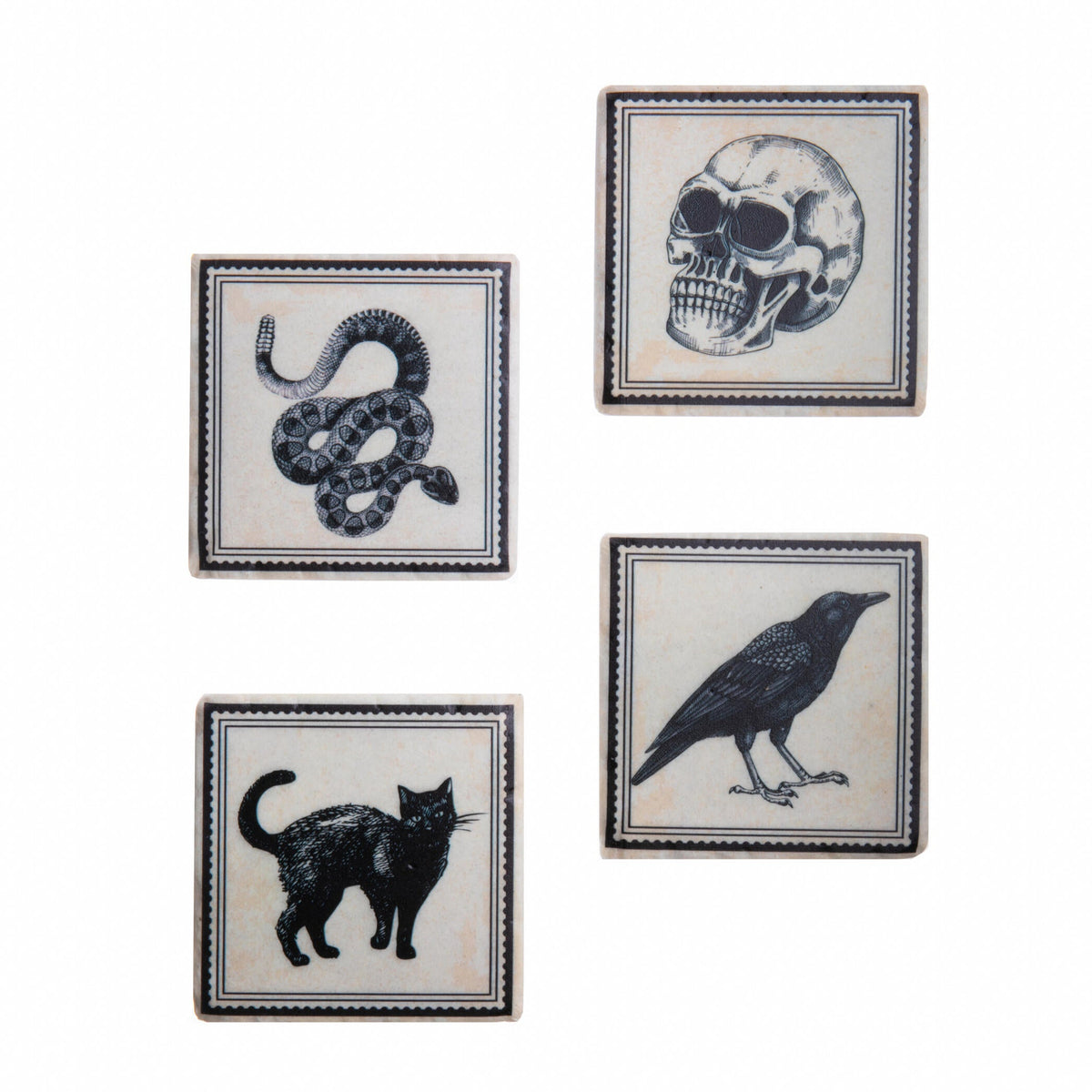 Set of four ceramic coasters featuring a snake, skull, cat, and crow on a white background.