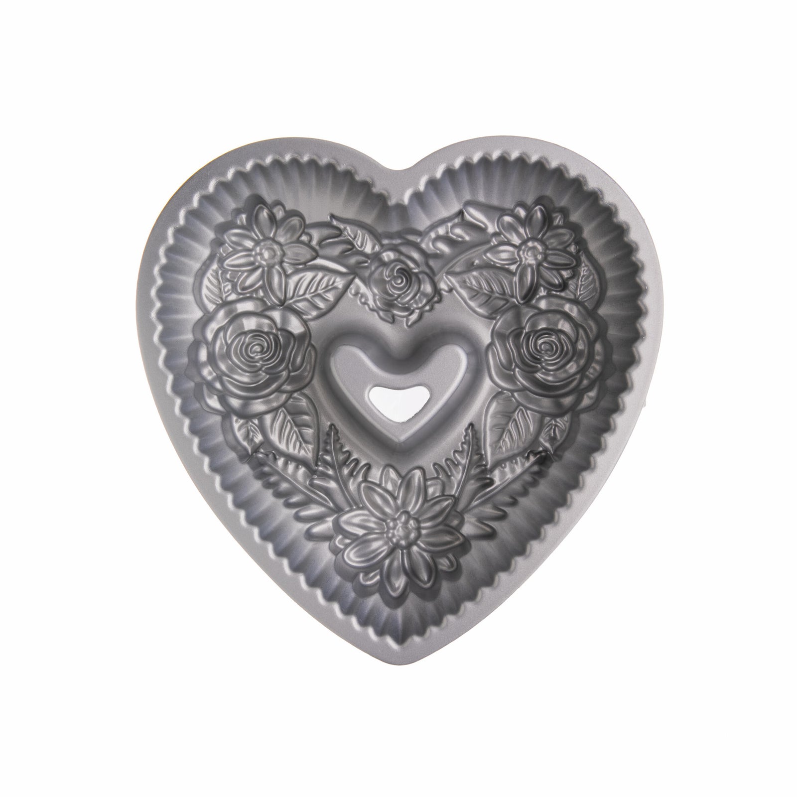 Heart shaped floral bundt baking pan on a white background.