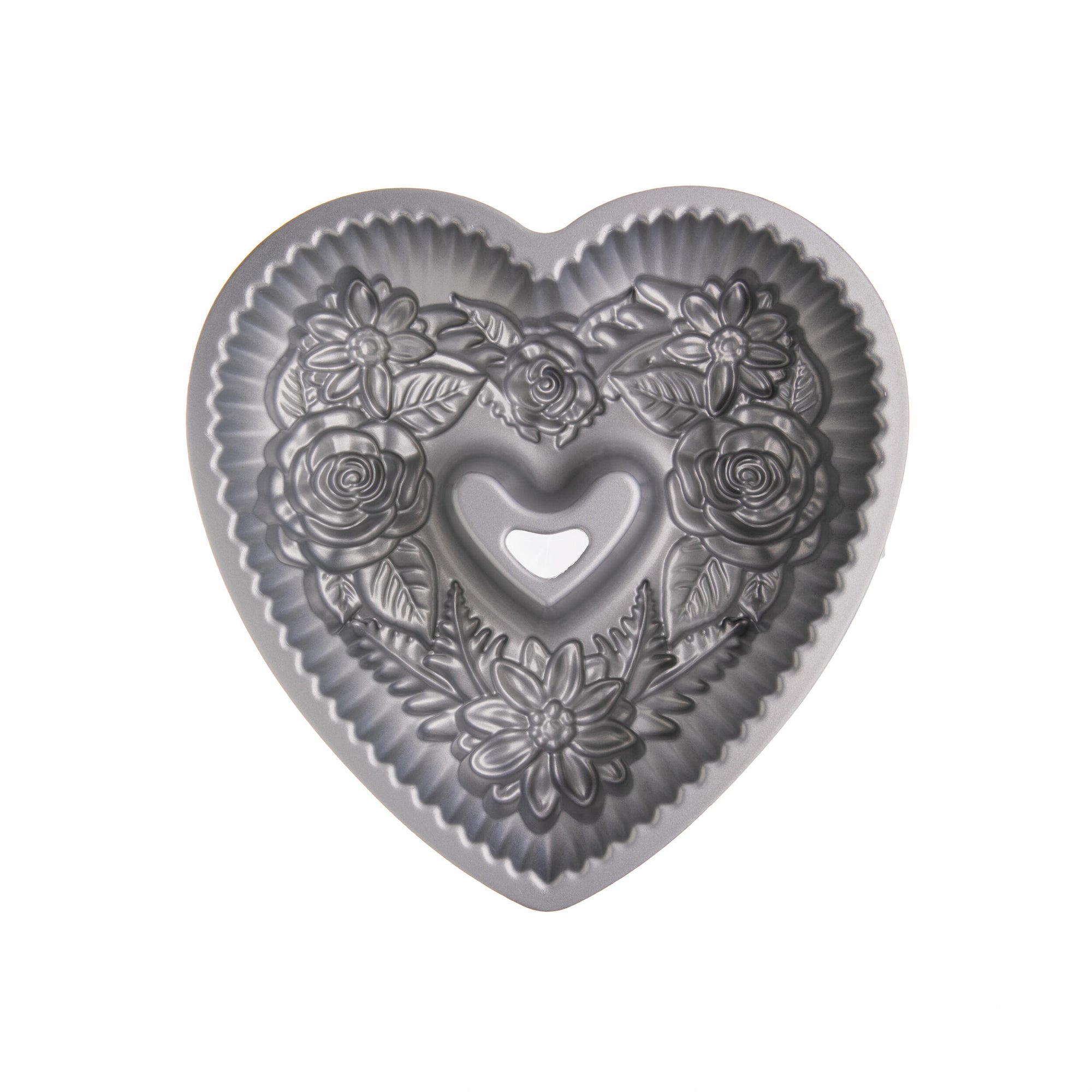 Heart shaped floral bundt baking pan on a white background.