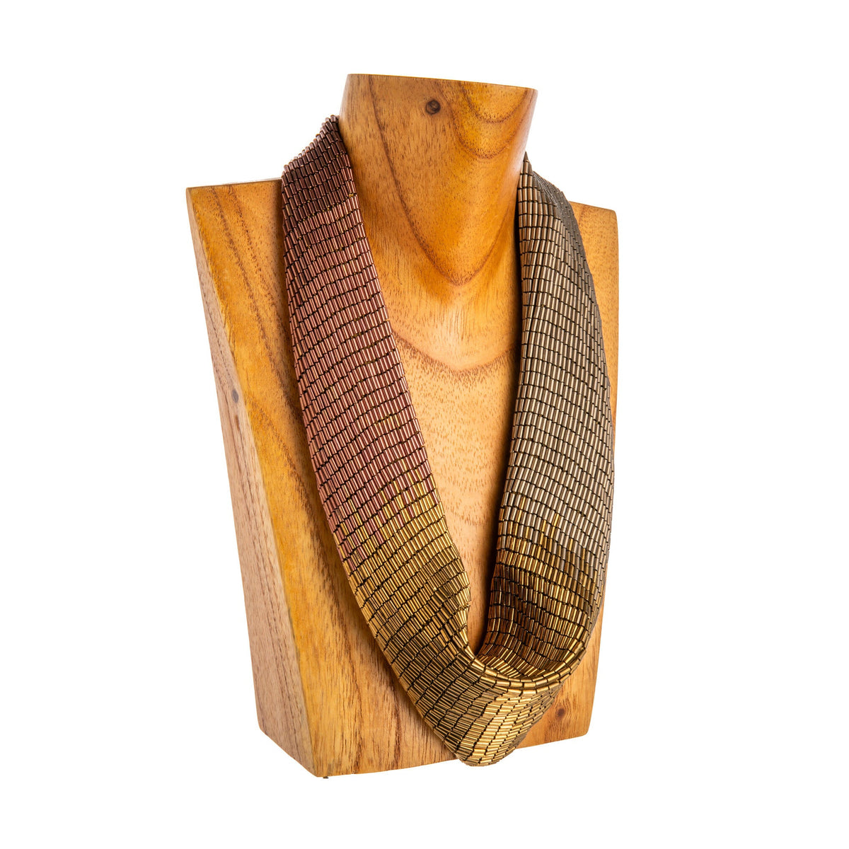 Rose gold beaded scarf necklace by Mignonne Gavigan draped over a wooden mannequin bust on a white background