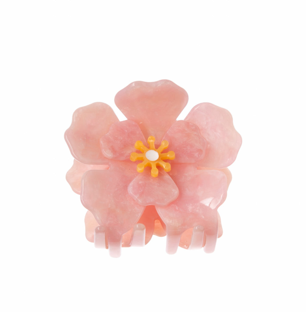 This pink Icelandic Poppy hair clip has a layered, 3D construction, truly capturing the essence of a beautiful flower in full bloom. These unique hair clips are carefully crafted from cellulose acetate, an eco-friendly, biodegradable material made from recycled wood pulp. The clip is double sided for a perfect look from every angle!