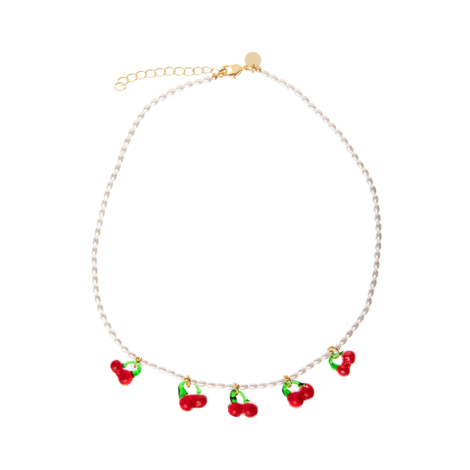 Pearl necklace with red and green glass cherry charms on a white background.