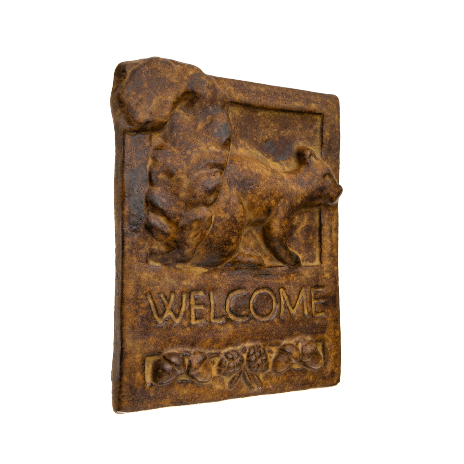 Inspired by the simplicity and style of the Craftsman movement, this handmade ceramic 'welcome' tile features a squirrel with a stack of acorns. It is hand fired and glazed with a vintage-style tan glaze, and has a cord attached to the back for easy hanging. Dimensions: 8" x 12" x 2" By artist Janet Ontko. Made in USA.
