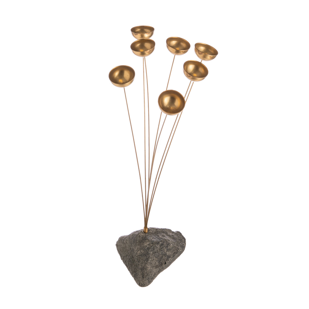 In 1979, Grammy® Award winning musician Garry Kvistad decided to set about making the world's best sounding windchime. This wonderful, musically tuned Woodstock Chime is the result of his labors. Wind chime with seven, solid brass bells Suitable for use indoors or outdoors. Dimensions: 20" tall.