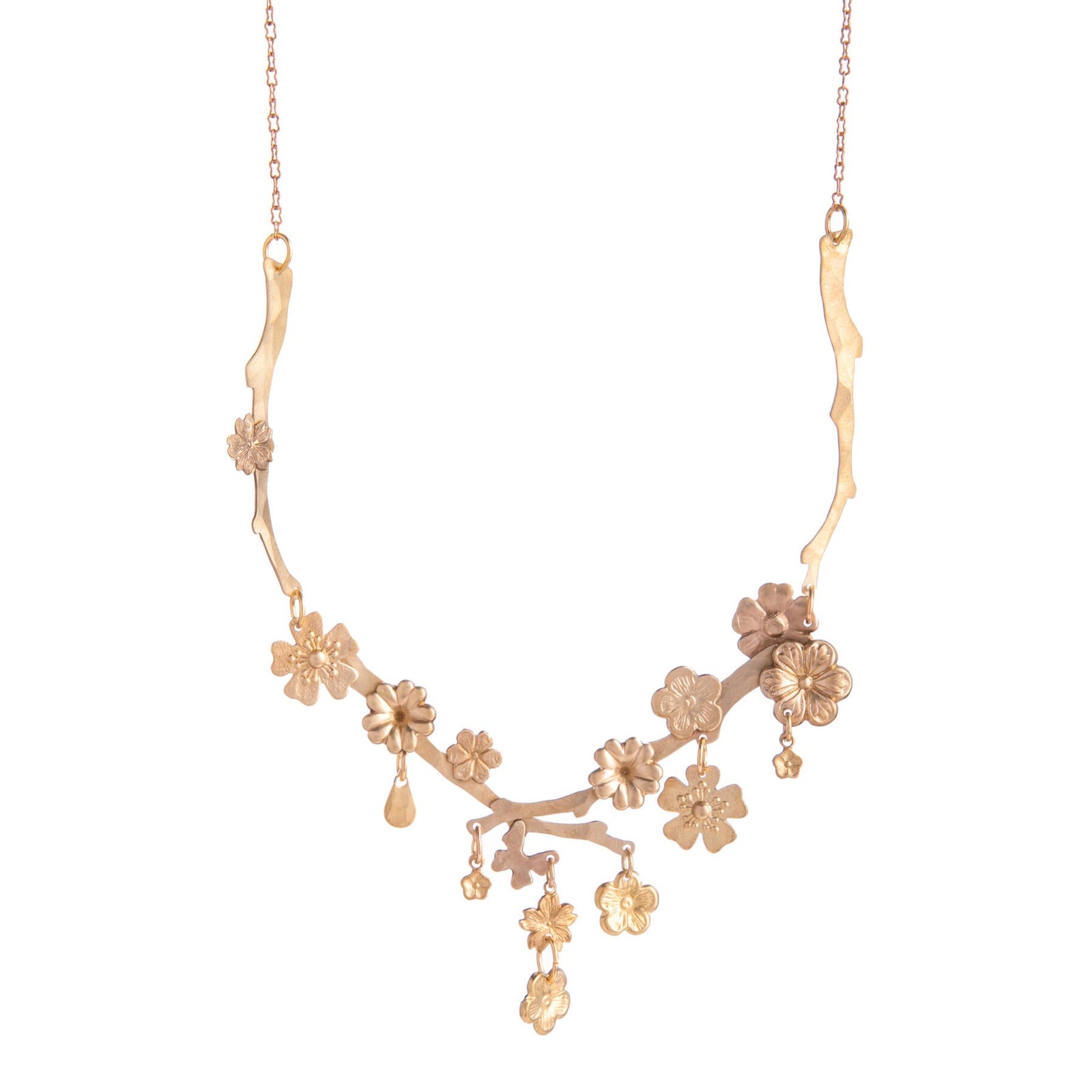A gold-colored brass cherry blossom dangle necklace with adjustable chain and floral pendants.