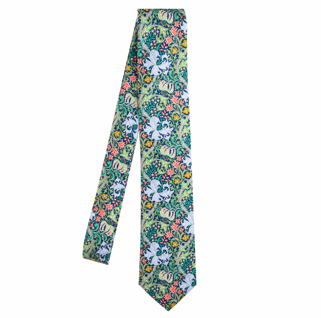 Add style to your wardrobe with this striking and sophisticated silk tie, designed by the Huntington Store and featuring William Morris's Golden Lily, an original drawing of which is held in The Huntington's Art Collections. William Morris, a leading figure of the Arts and Crafts movement, was known for his wonderfully patterned designs based on his observations of nature