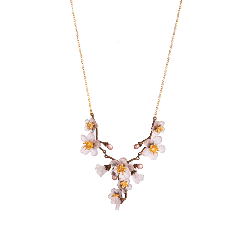 This Cherry Blossom Statement Necklace beautifully embodies the enchanting essence of spring, representing renewal, love, and delightful elegance.