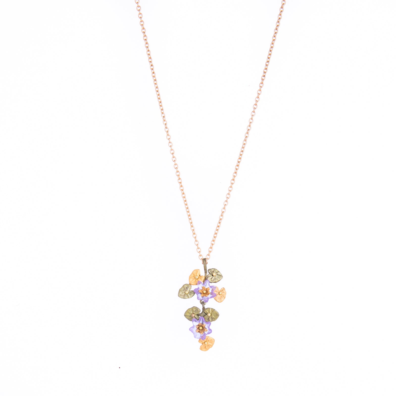 Inspired by Claude Monet's depictions of his lily pond in Giverny, France, this delicate and detailed necklace is made from cast bronze, with a 24k gold finish. Cast bronze with a 24k gold finish. Cast glass accents. Handmade in the USA by designer Michael Michaud.