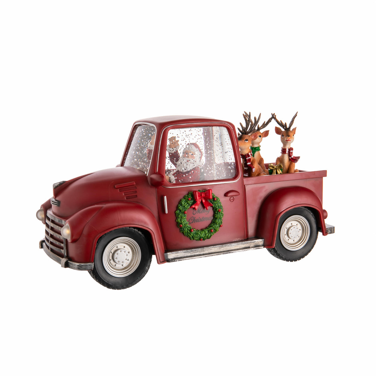 Decorative red truck with Santa, reindeer and wreath on a white background