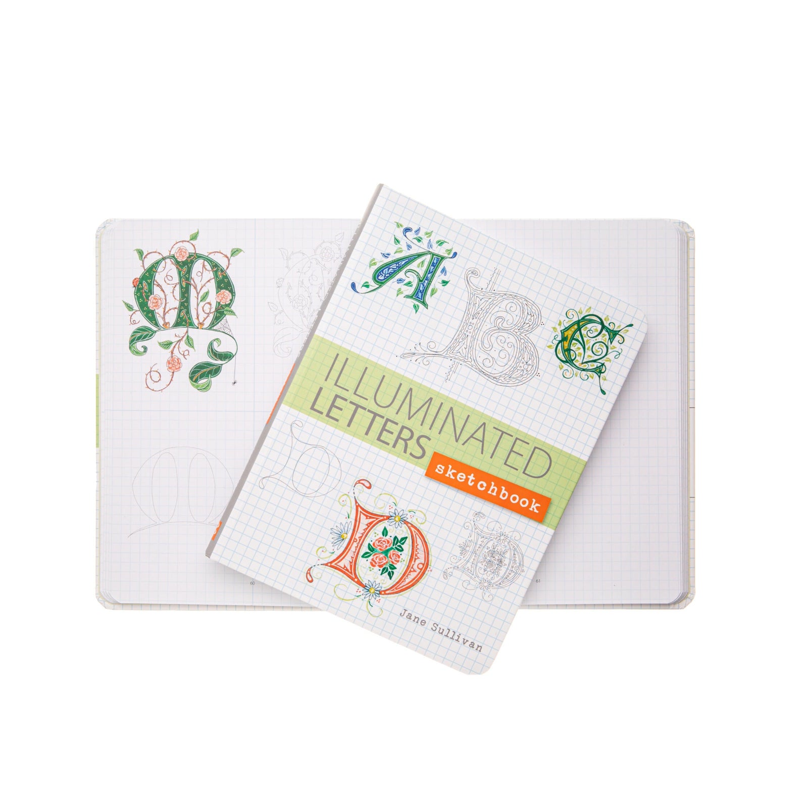 Two notebooks with illuminated letters on a white background