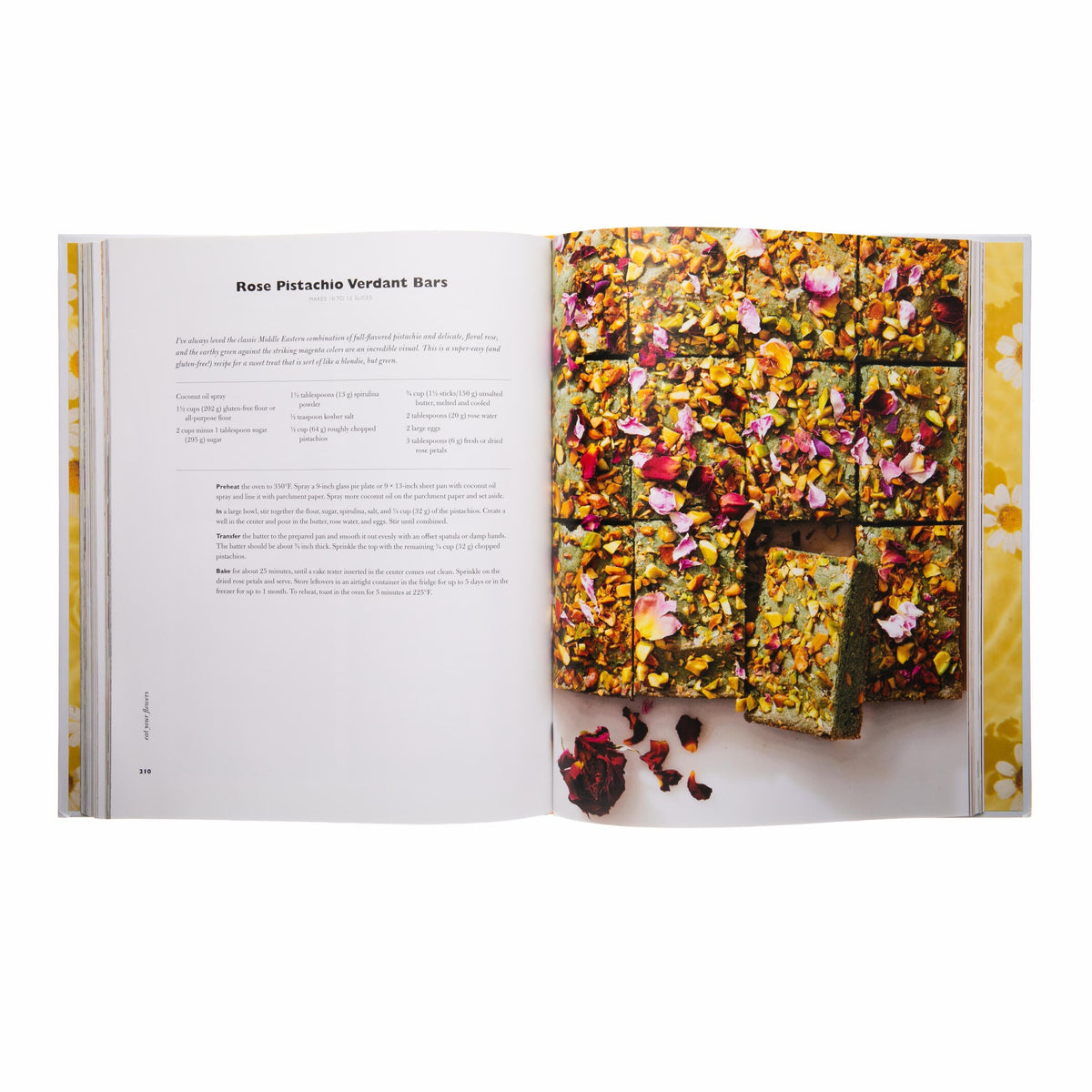 Open book showing a recipe with a colorful dessert image on a white background