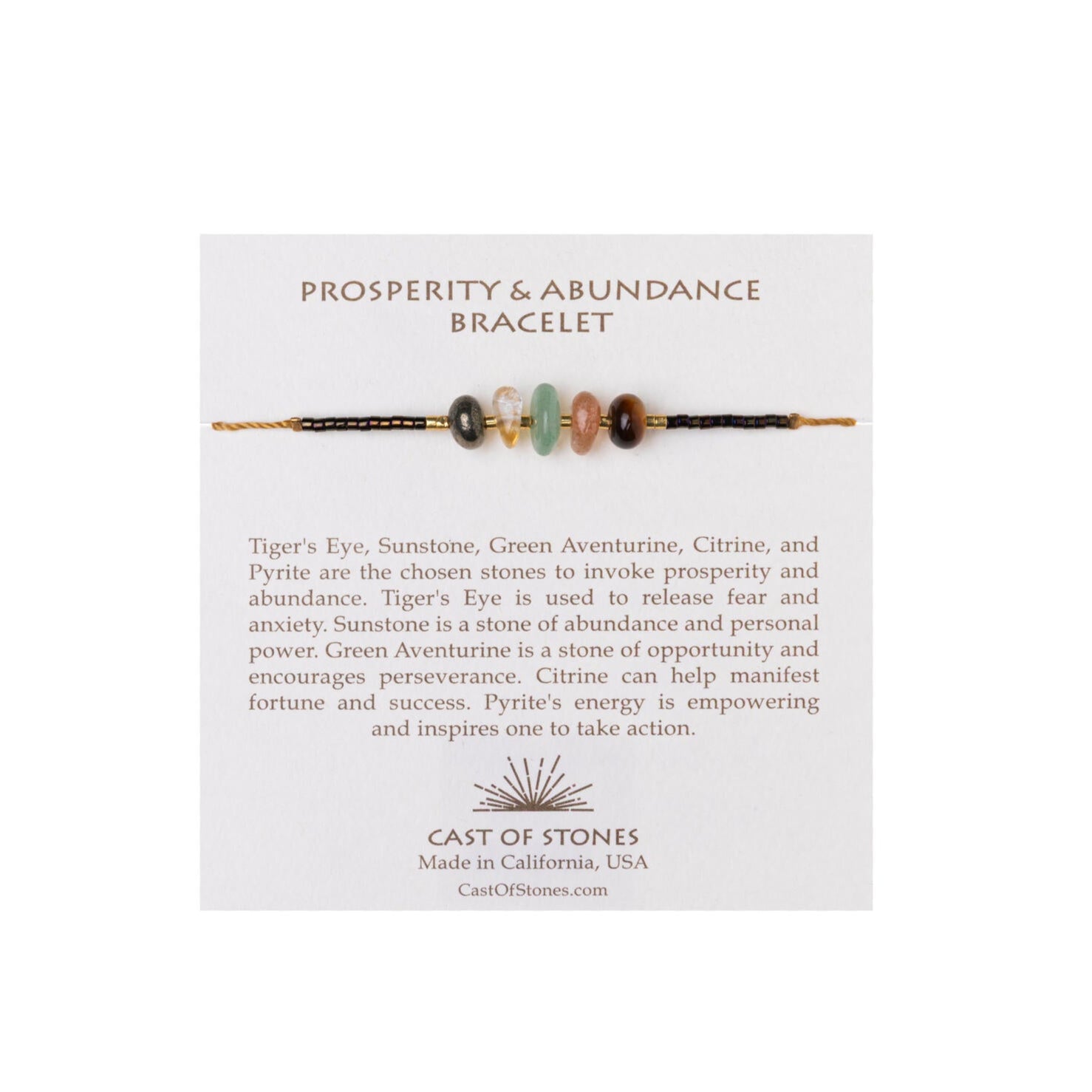 Bracelet on a display card with 'Prosperity & Abundance' text and 'Cast of Stones' branding.