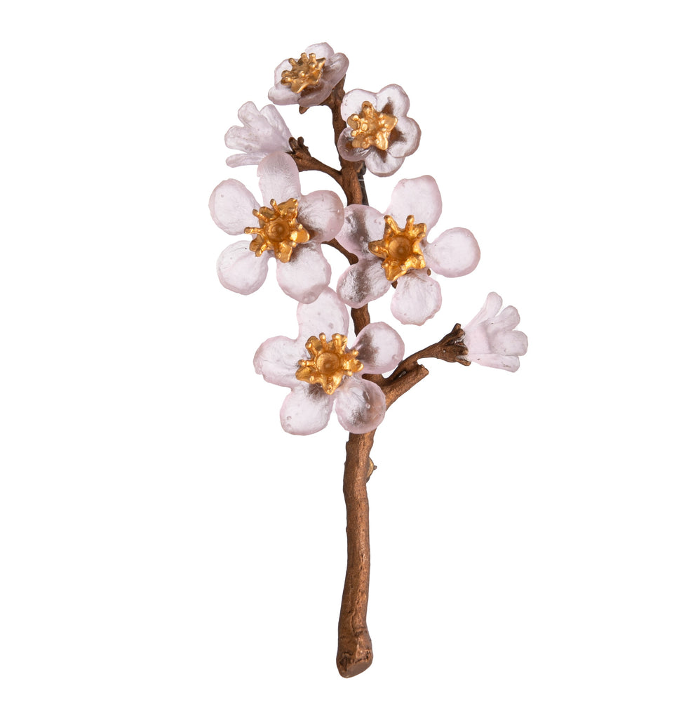 This Cherry Blossom Brooch beautifully embodies the enchanting essence of spring, representing renewal, love, and delightful elegance. Inspired by nature, this collection showcases handcrafted glass flowers that shine with the soft, ethereal glow of real cherry blossoms. Each intricately detailed petal captures the enchanting beauty of this cherished bloom, allowing you to carry a piece of spring with you wherever you go! 